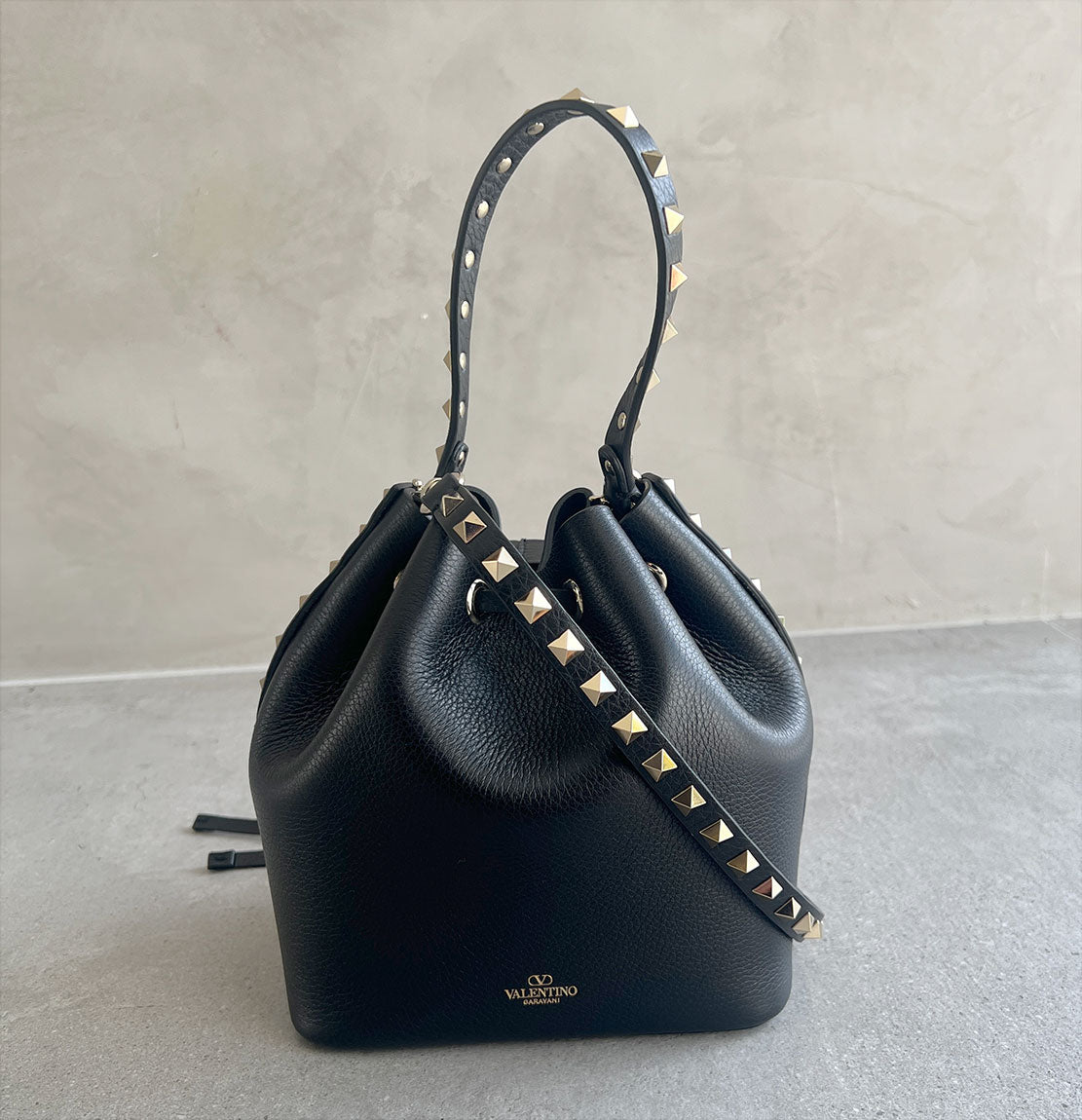 Valentino Rockstud Buckle Detail Leather Bucket Bag in Black | Luxury Shoulder Handbag for Women | Perfect for Evening Parties & Date Nights