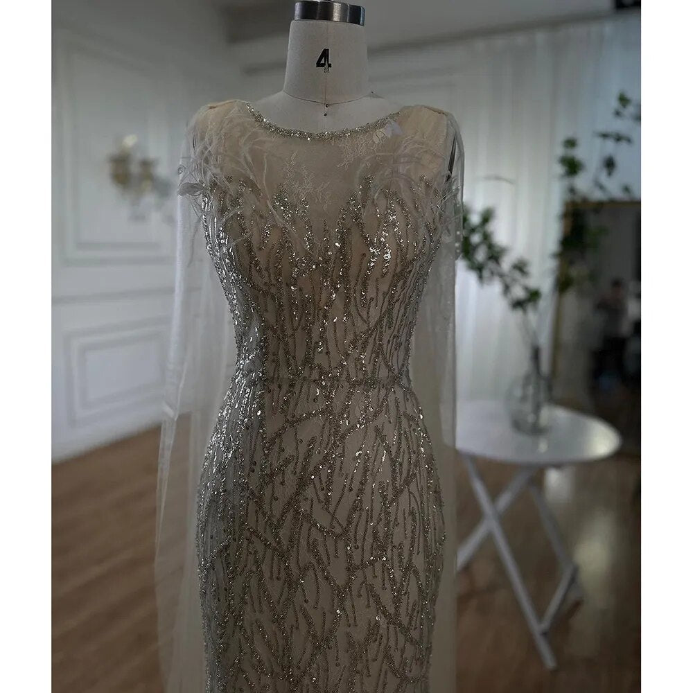 Luxury Beige Mermaid Shawl Evening Gown with Beaded Feathers - Elegant Dubai Party Dress for Women 2025 | Perfect for Weddings, Galas & Formal Events