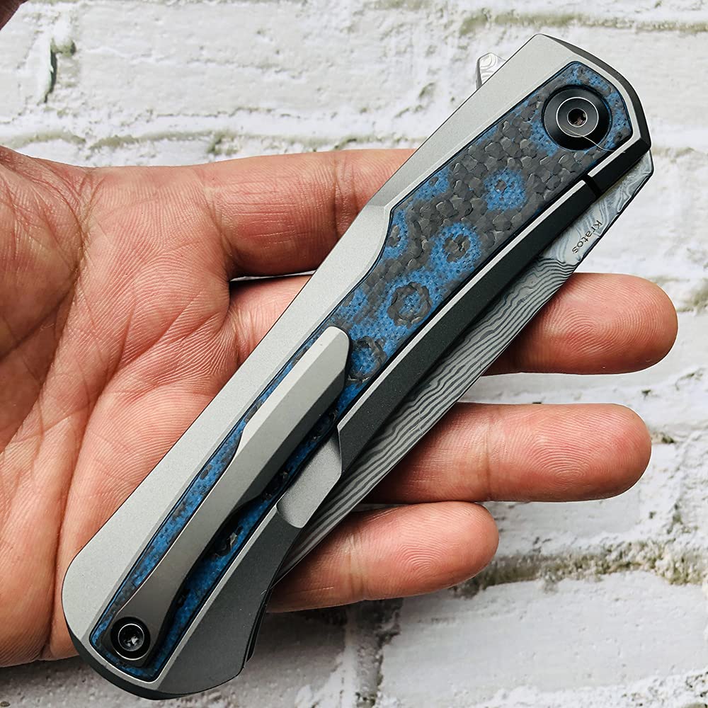 Kansept Kratos Damascus Folding Pocket Knife - 8.69in Titanium Handle with Blue Black Fat Carbon Fiber Inlays, 3.79in Clip Point Blade - EDC, Outdoor, Hunting, Camping, Survival Gear - Perfect for Everyday Carry, Bushcraft & Tactical Use