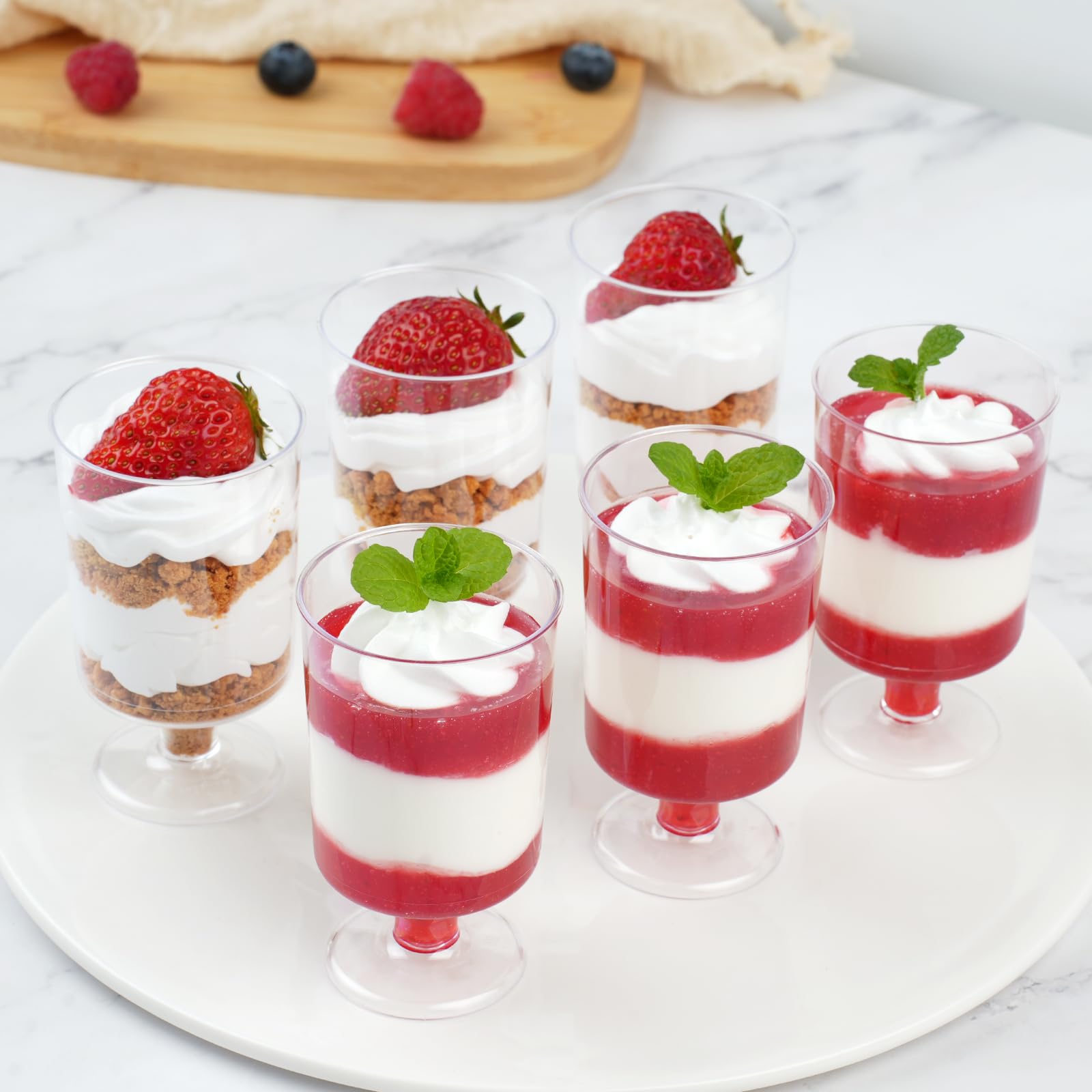 Zezzxu 40-Pack 3.4 oz Mini Dessert Cups with Spoons - Small Plastic Footed Goblet Glasses for Mousse, Appetizers, Puddings, Parfait - Perfect for Parties, Catering & Home Entertaining