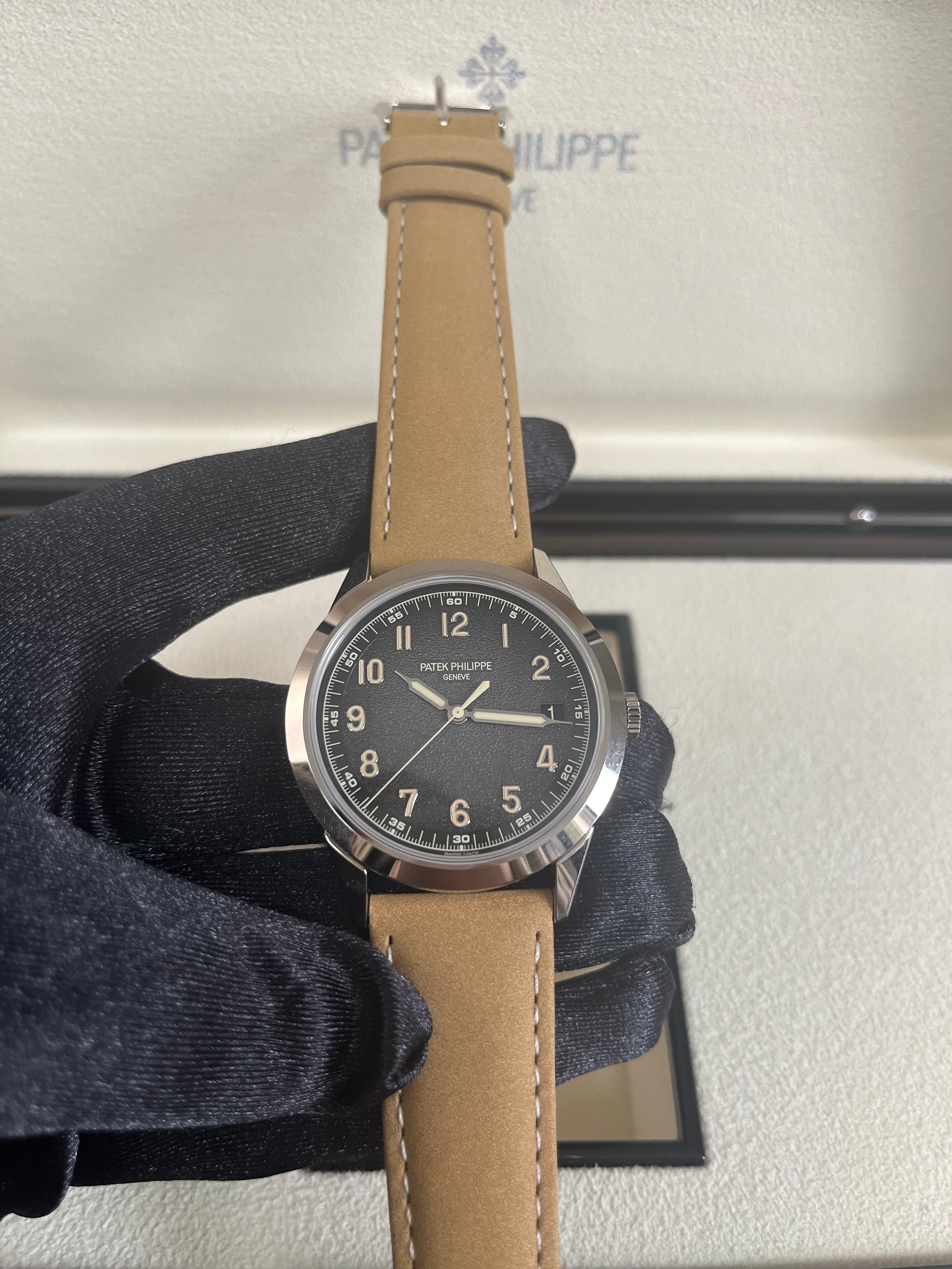 Patek Philippe Calatrava 5226G-001 40mm Men's Luxury Watch - 18K White Gold Case with Textured Dial - Perfect for Business Meetings & Formal Occasions