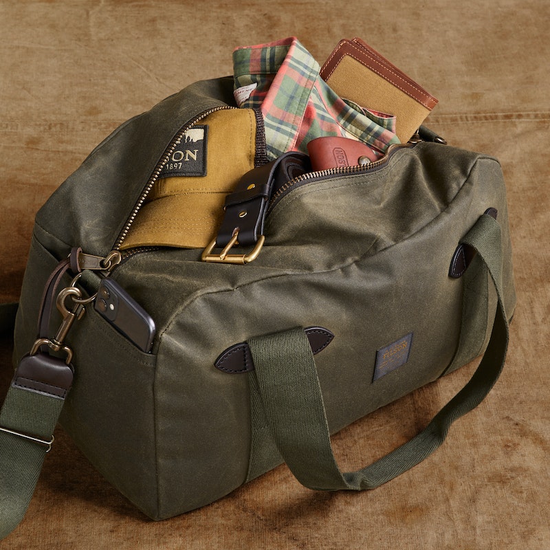 Filson Small Tin Cloth Duffle Bag - Waterproof & Durable Otter Green Travel Duffel - Perfect for Camping, Hiking & Weekend Getaways