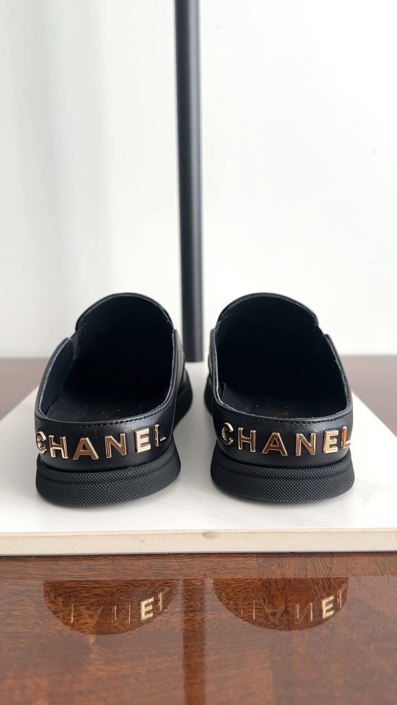 Chanel 2024 Black Leather Signature Logo Flat Mules Women's Size 36.5 - Comfortable Slip-On Shoes for Casual Wear & Office Outfits
