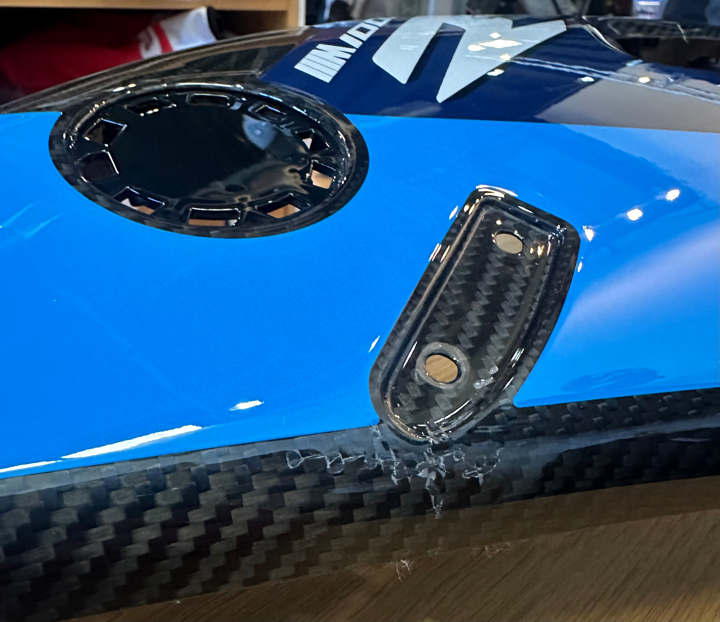 BMW M1000RR Left Side Trim Panel with Lettering - Lightly Damaged Replacement Part for Motorcycle Customization & Repair