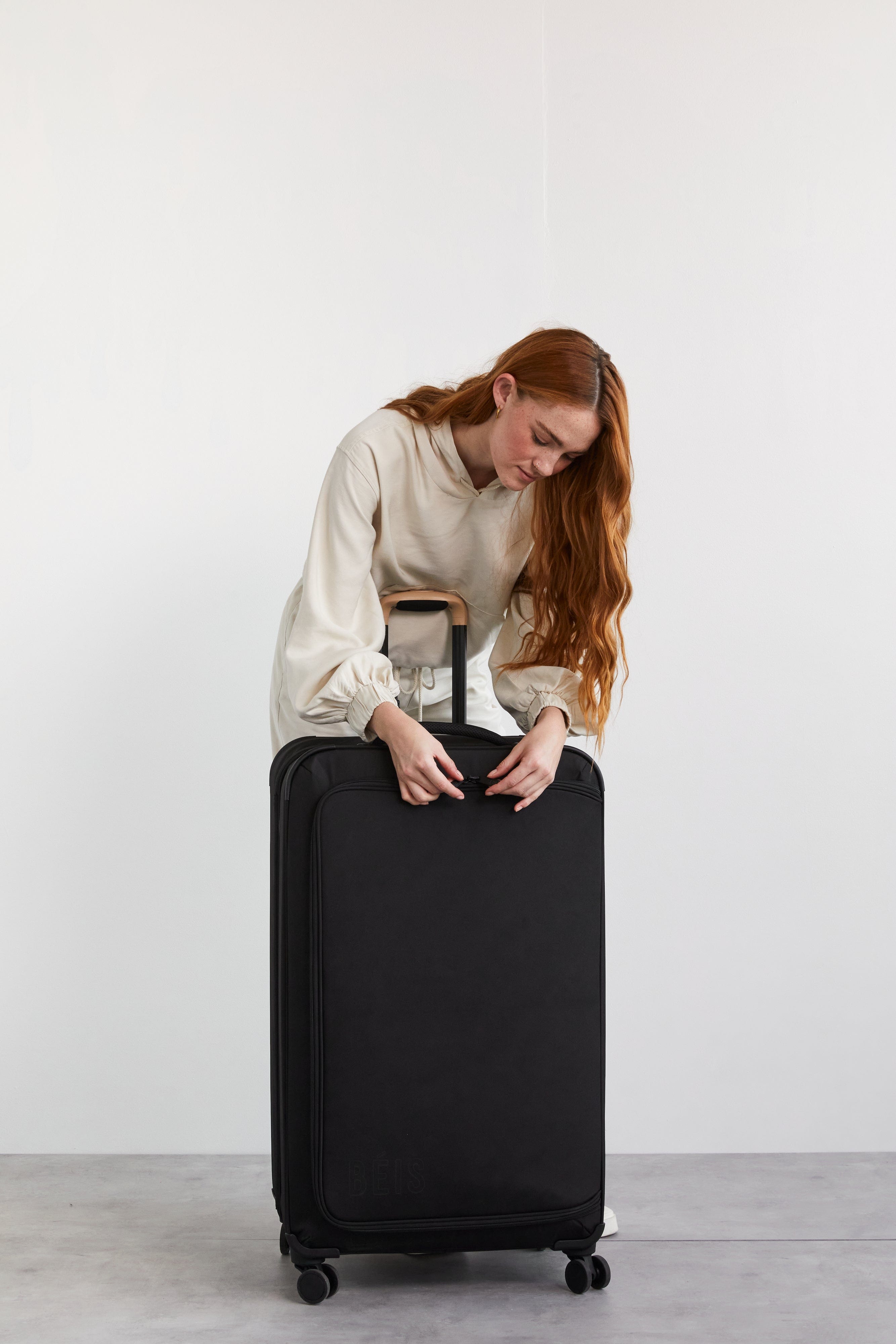 Soft Sided Collapsible Check In Roller Luggage - Black Expandable Carry On Suitcase for Travel, Business Trips & Weekend Getaways
