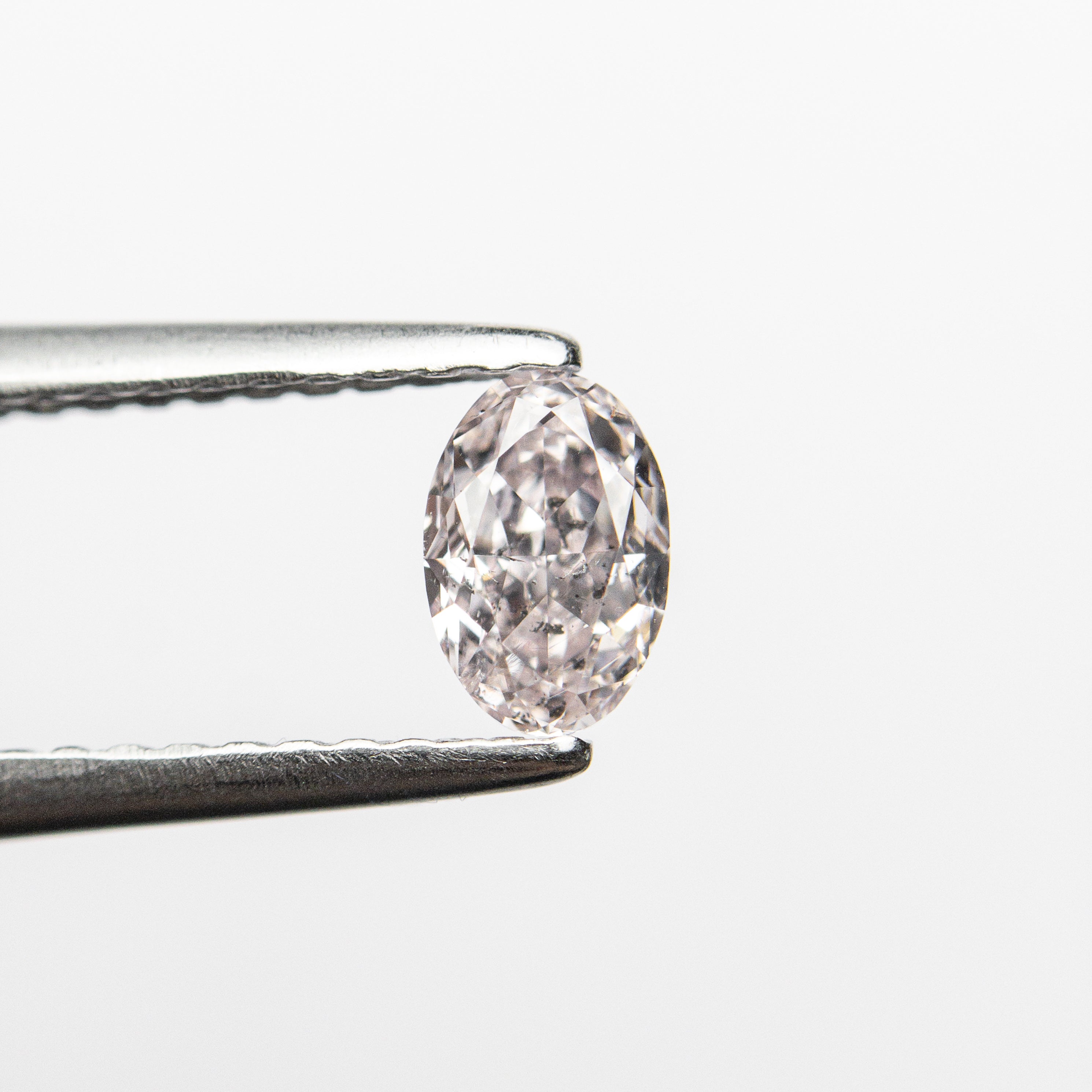0.40ct GIA Certified Fancy Light Pink Oval Diamond (5.38x3.60x2.59mm) - I1 Clarity Brilliant Cut for Engagement Rings & Fine Jewelry