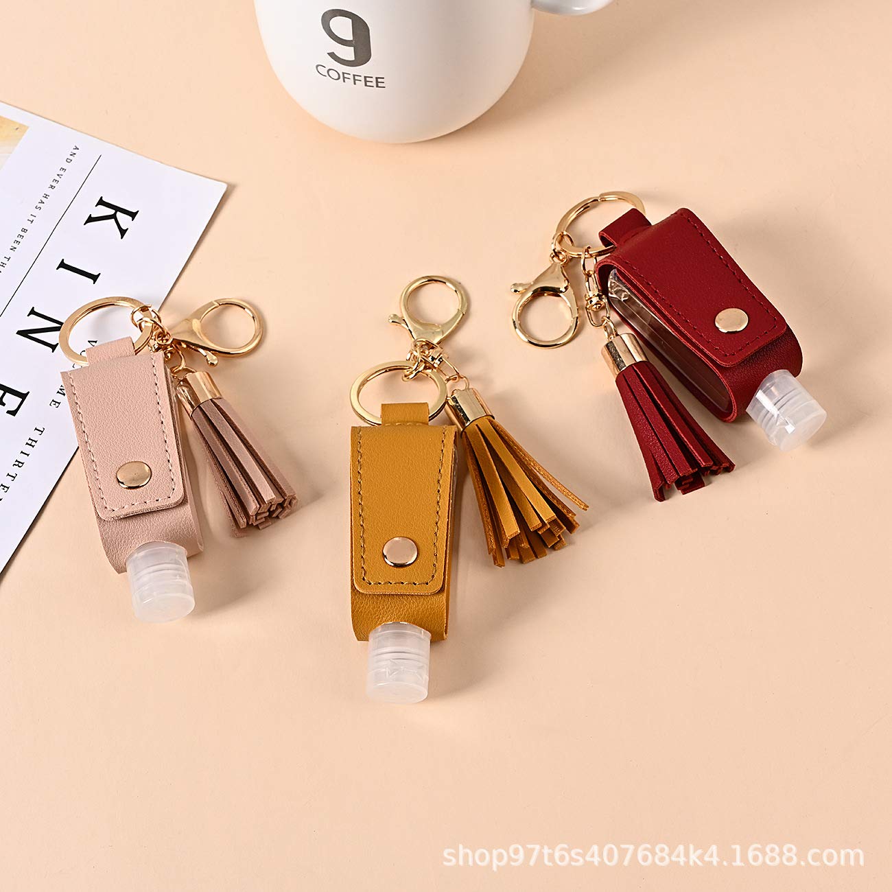 HSYHERE Portable Hand Sanitizer Keychain - 2oz Travel Size Refillable Bottle with PU Leather Tassel - Multi-Purpose Key Ring for Car Keys, Purse, Backpack - Perfect for Travel, Office, Gym & Daily Hygiene