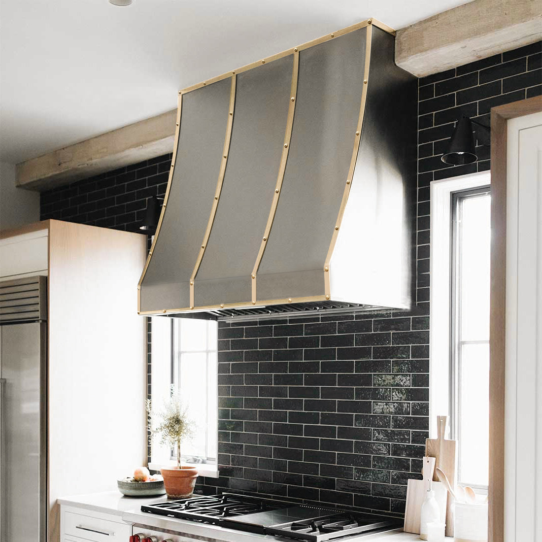 Premium RHM Stainless Steel Designer Kitchen Range Hood - Modern Sloped Shape for Christie's Project | Ventilation Solution for Luxury Homes & Professional Kitchens