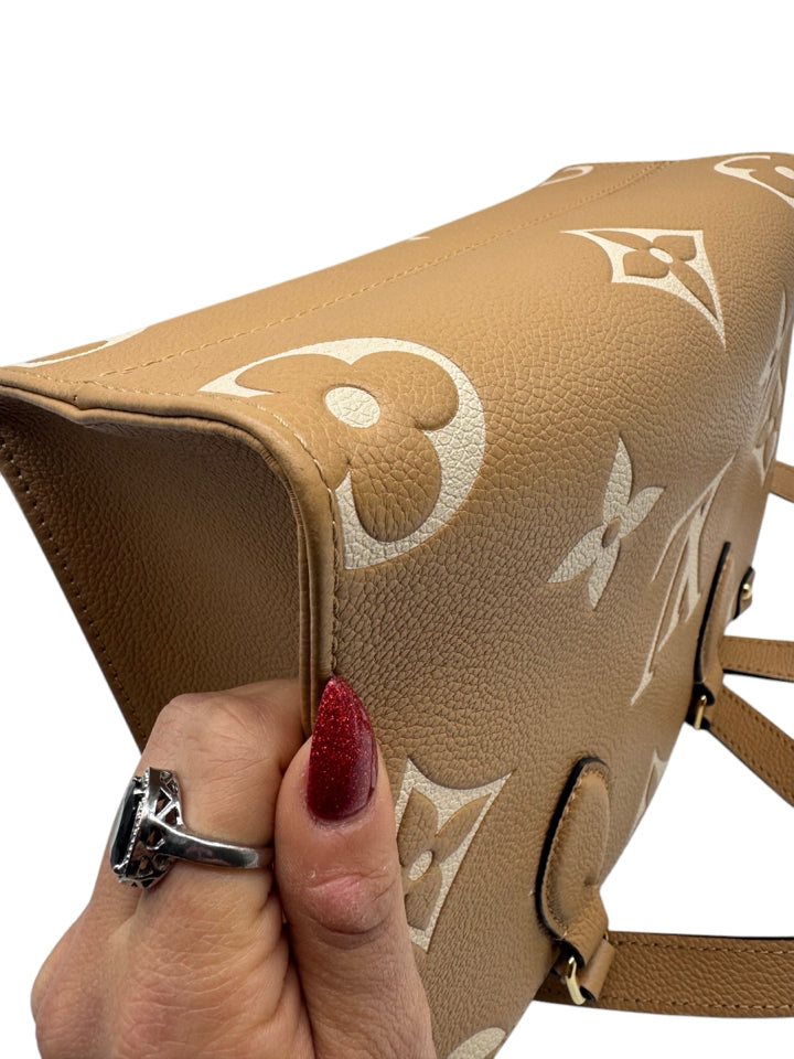 Louis Vuitton Bicolor Empreinte Leather On The Go Tote Bag - Stylish Designer Handbag for Women, Perfect for Work, Travel and Everyday Use