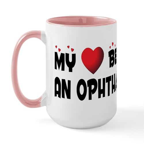 White/Pink Inside - Belongs To An Ophthalmologist Large Mug