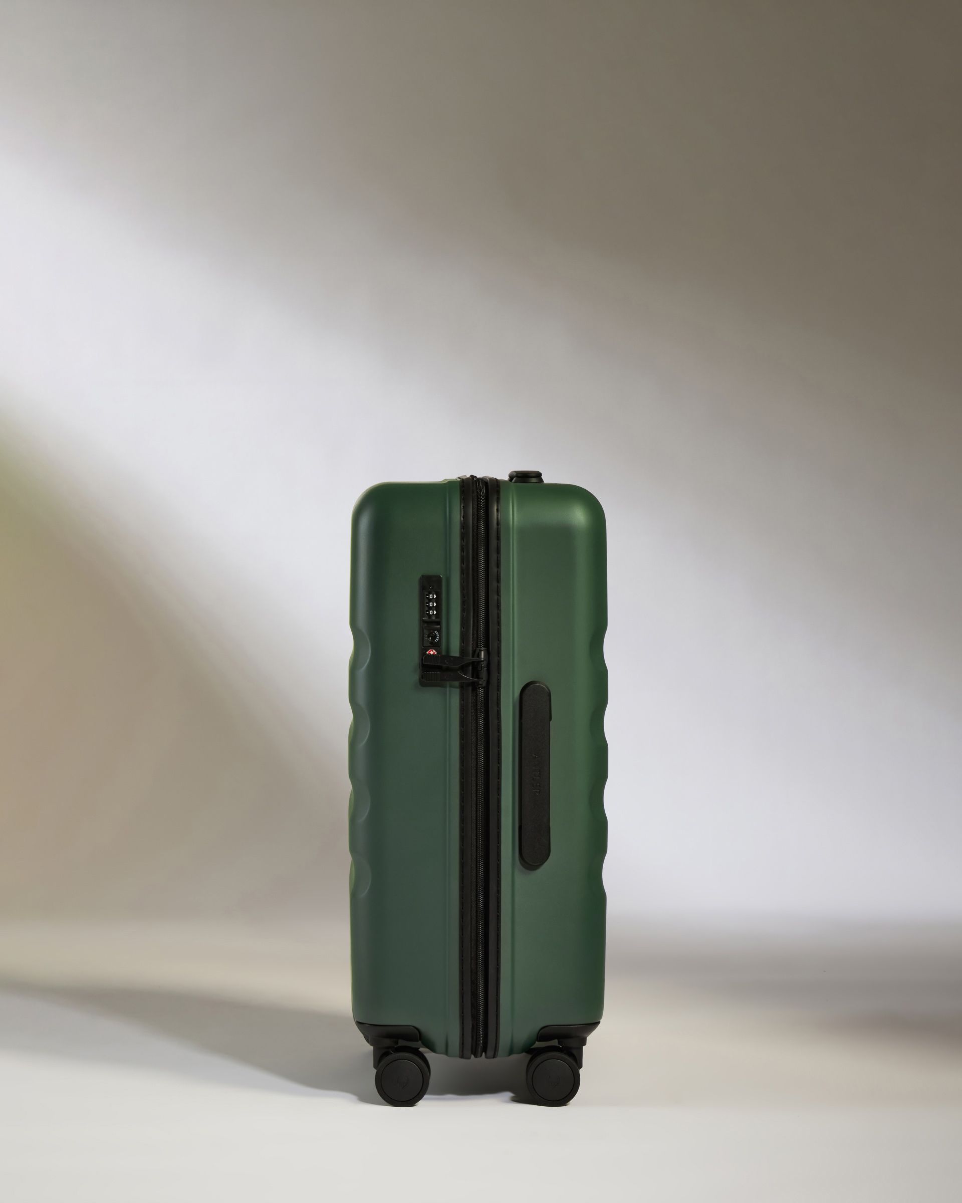 Antler Green Large Carry On Luggage with Icon Stripe - Lightweight Expandable Suitcase for Air Travel, Business Trips & Weekend Getaways