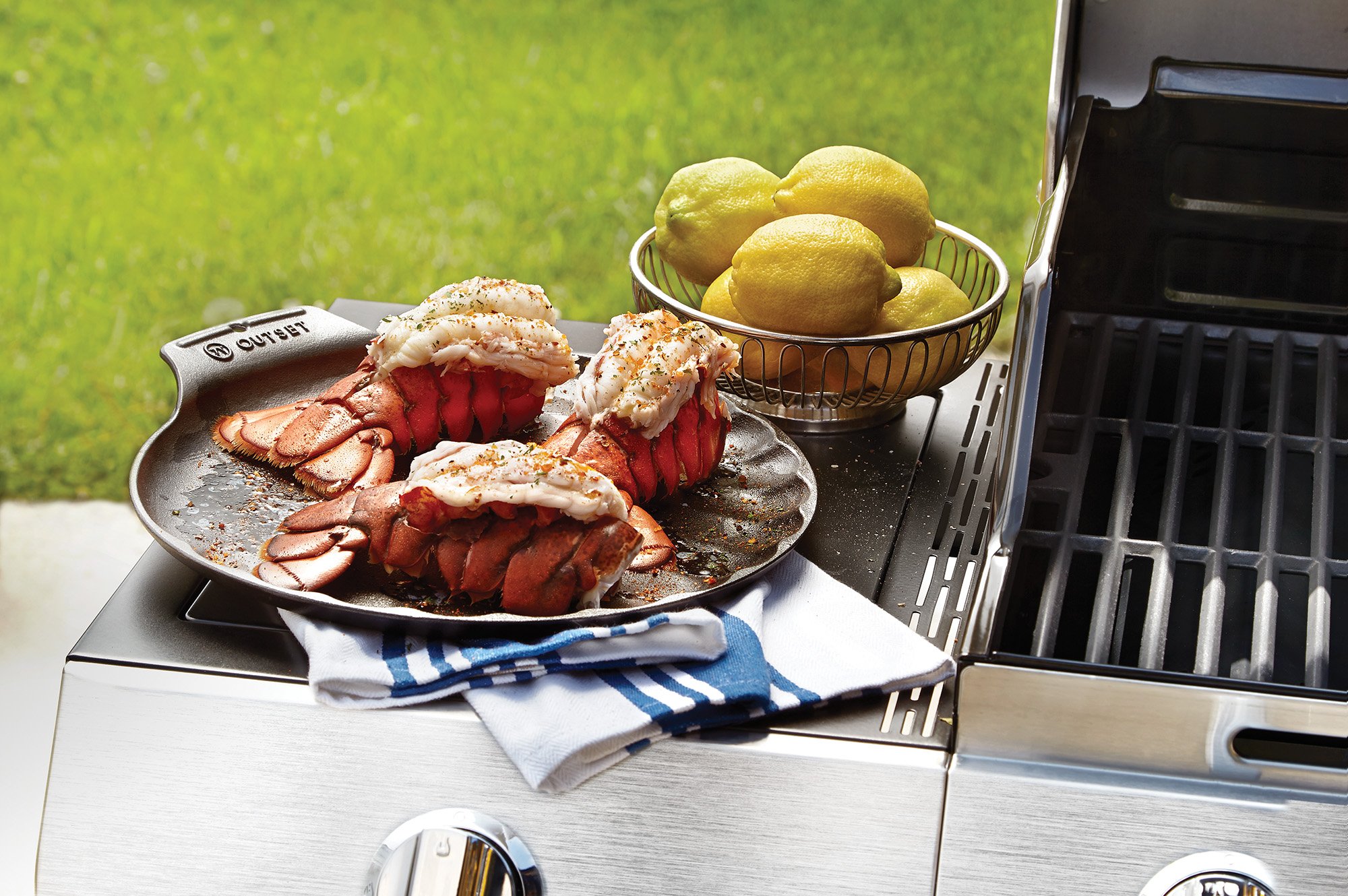 Outset 76378 Scallop Cast Iron Grill and Serving Pan - Black | Heavy Duty Pre-Seasoned Griddle for Steak, Seafood & Vegetables | Perfect for Indoor & Outdoor Cooking, Camping, BBQs & Family Gatherings