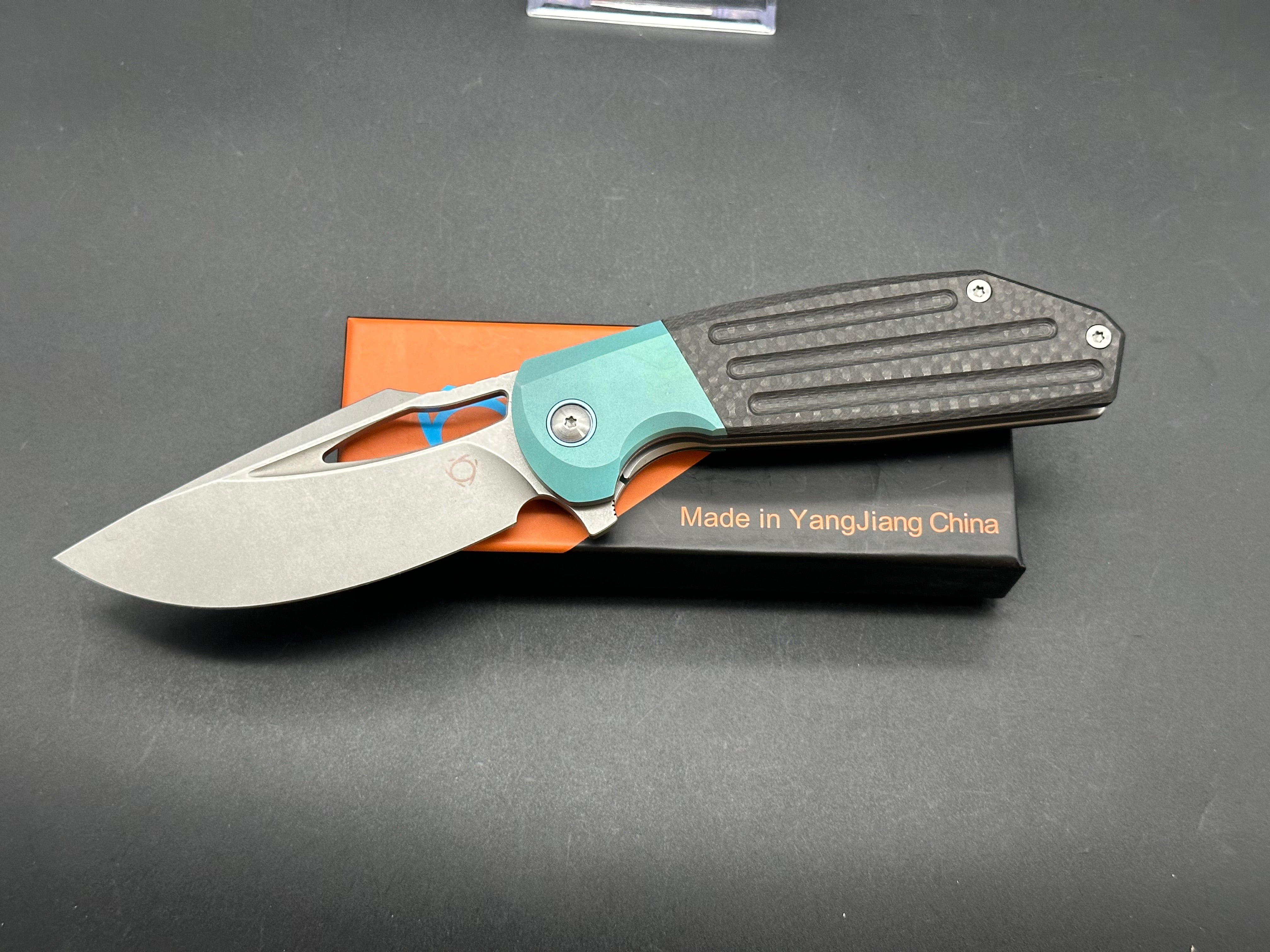 SIXLEAF SL 24 Jerry Jelly Pocket Knife - Plain Edge D2 Blade, Green Titanium Bolster & Carbon Fiber Handle - EDC, Camping, Hiking, Survival Gear