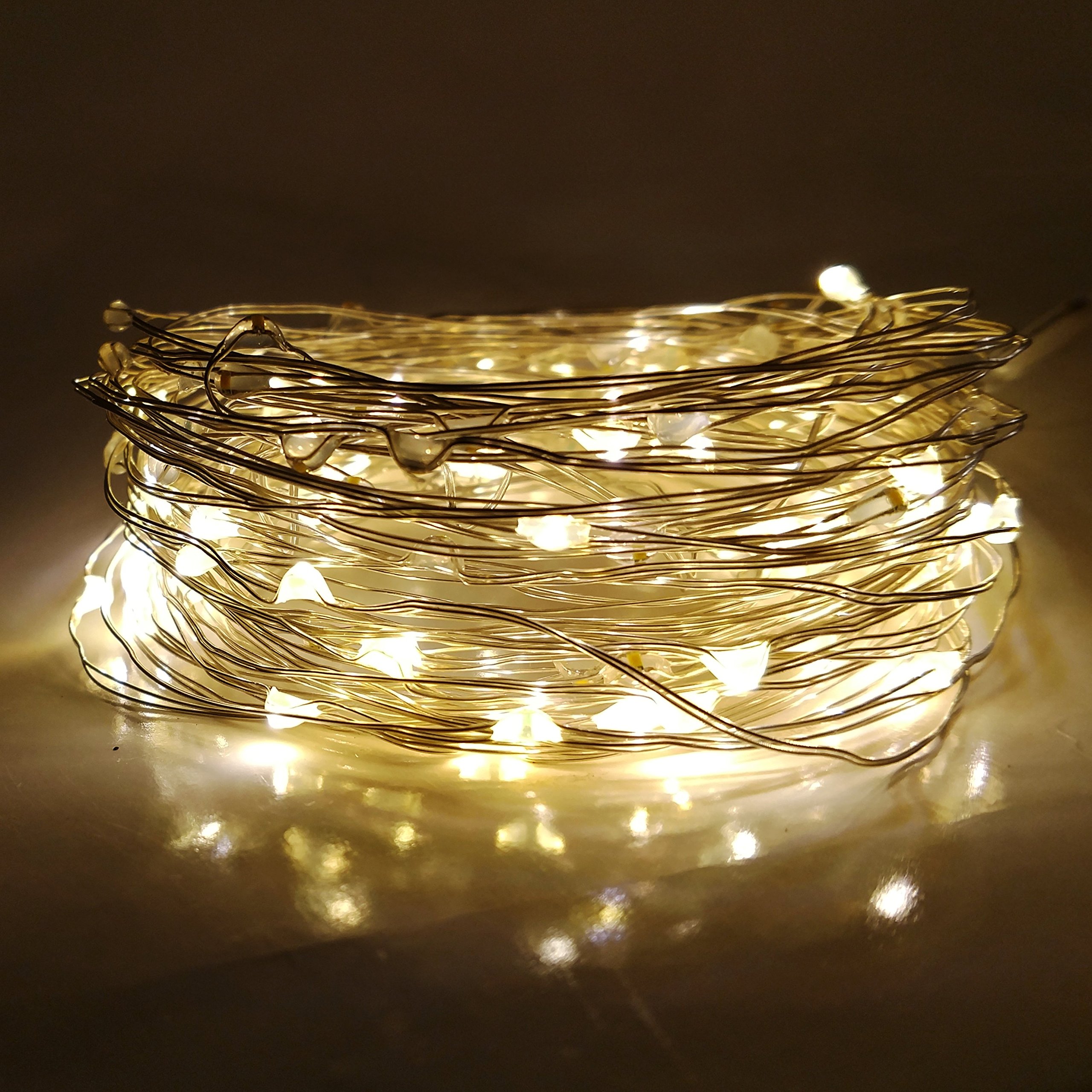 Solar Powered Micro LED String Lights - 100 LED, 33 Feet - Warm White, 8 Modes, Outdoor Waterproof Fairy Lights for Garden, Patio, Wedding, Party, Christmas Decorations - Perfect for Backyard, Balcony, and Indoor Home Decor