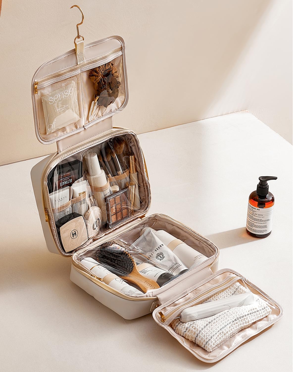 EACHY Hanging Toiletry Bag for Women - PU Leather Waterproof Travel Makeup Organizer with 4 Compartments & Hook - Portable Cosmetic Case for Bathroom, Gym, Vacation Essentials (Beige)