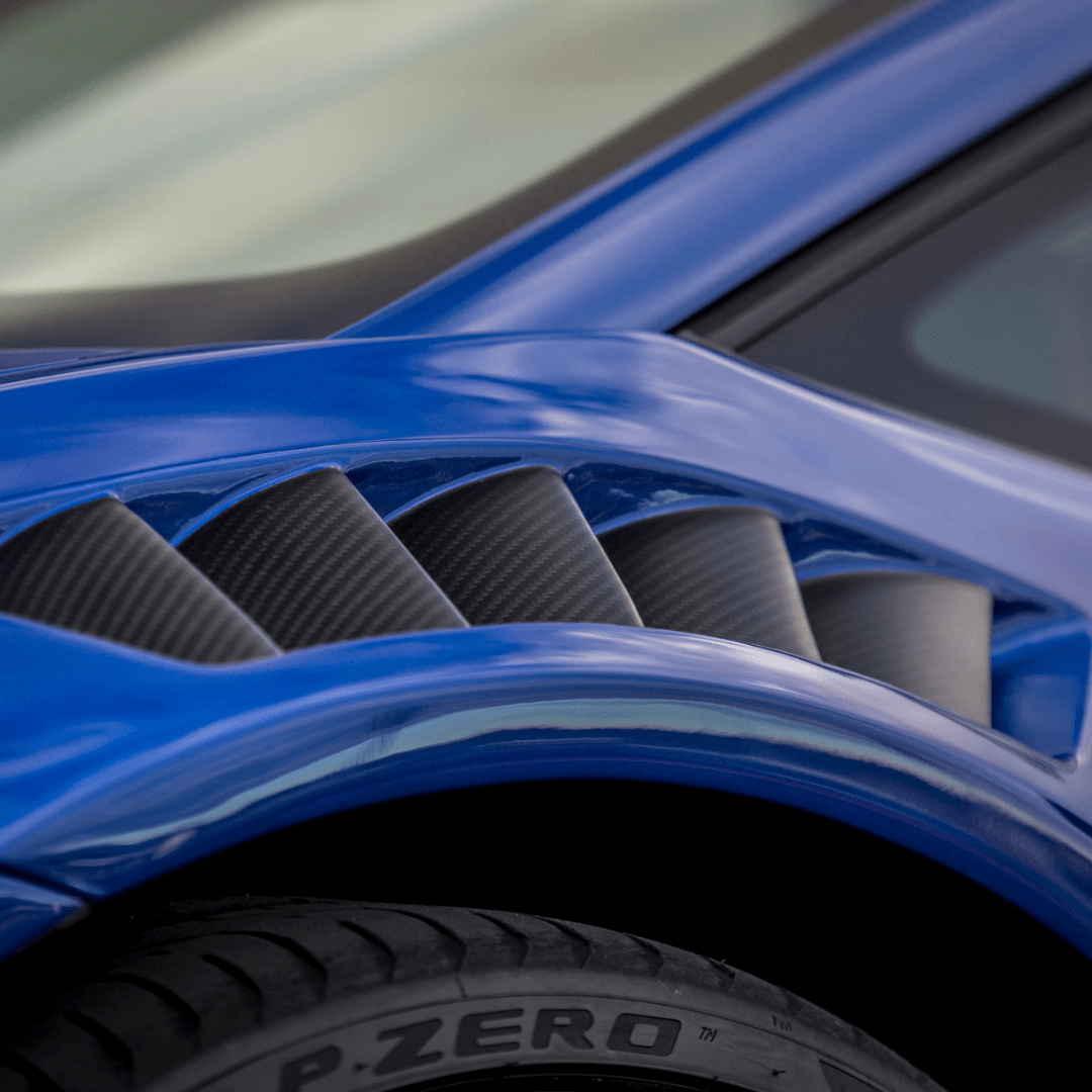 Lamborghini Huracan Novara Edition Aero Front Fenders with Integrated Vents & Splash Guards - 2x2 Gloss Carbon Fiber - High-Performance Upgrade for Track & Street Racing