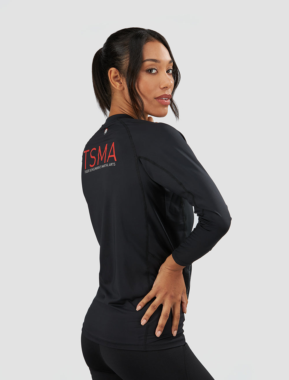 Rebel Rashguard for Men & Women - UPF 50+ Sun Protection Black Swim Shirt for Surfing, Swimming & Water Sports