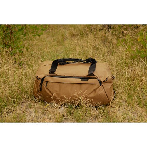 Peak Design Travel Duffel 50L - Waterproof Carry-On Duffel Bag for Travel & Adventure | Coyote Brown | Perfect for Camping, Hiking & Airplane Carry-On Luggage