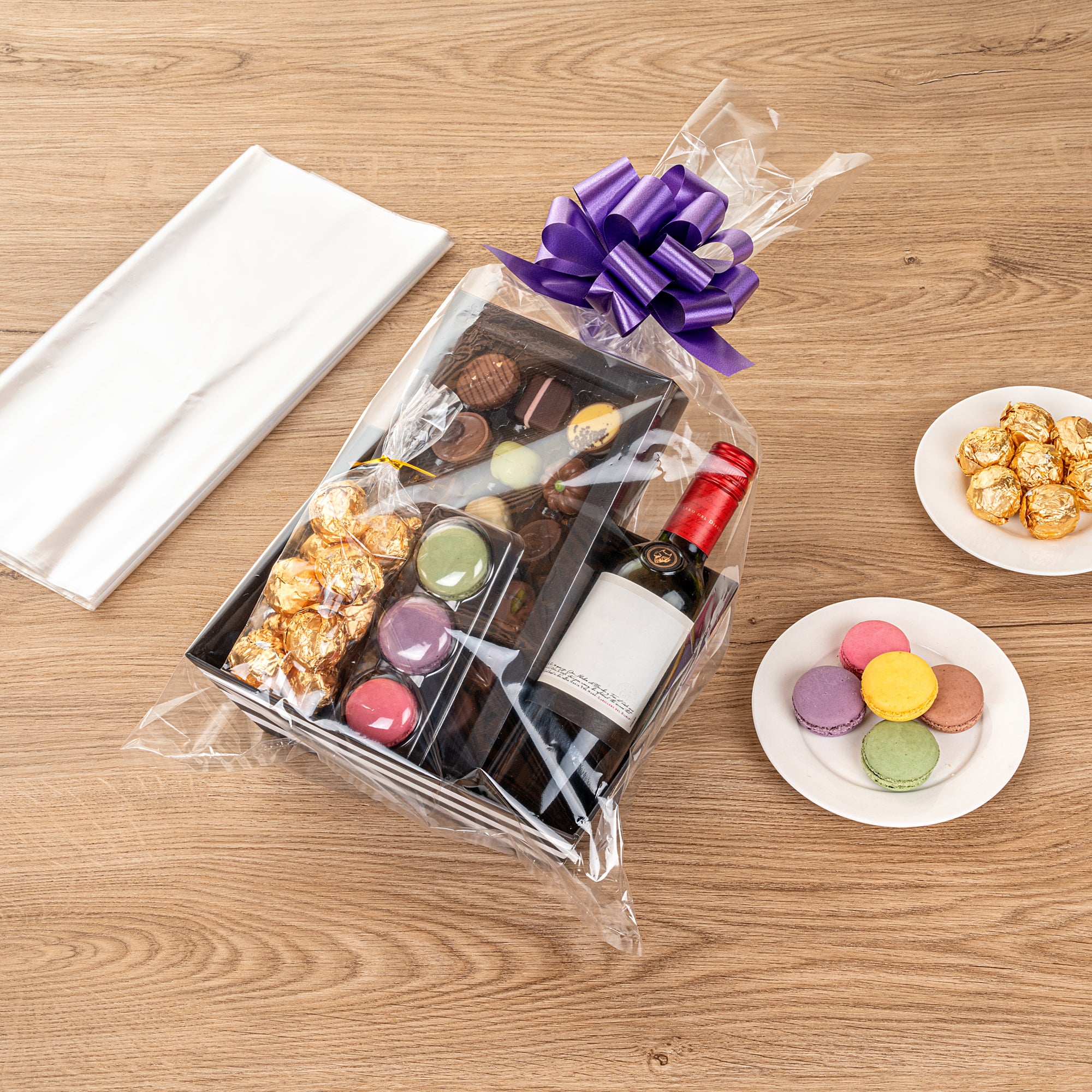 Clear Plastic Gift Basket Wrap Sheets - 14 x 24 Inches - 100 Count Box - Perfect for Party Favors, Wedding Decorations & Holiday Gift Wrapping