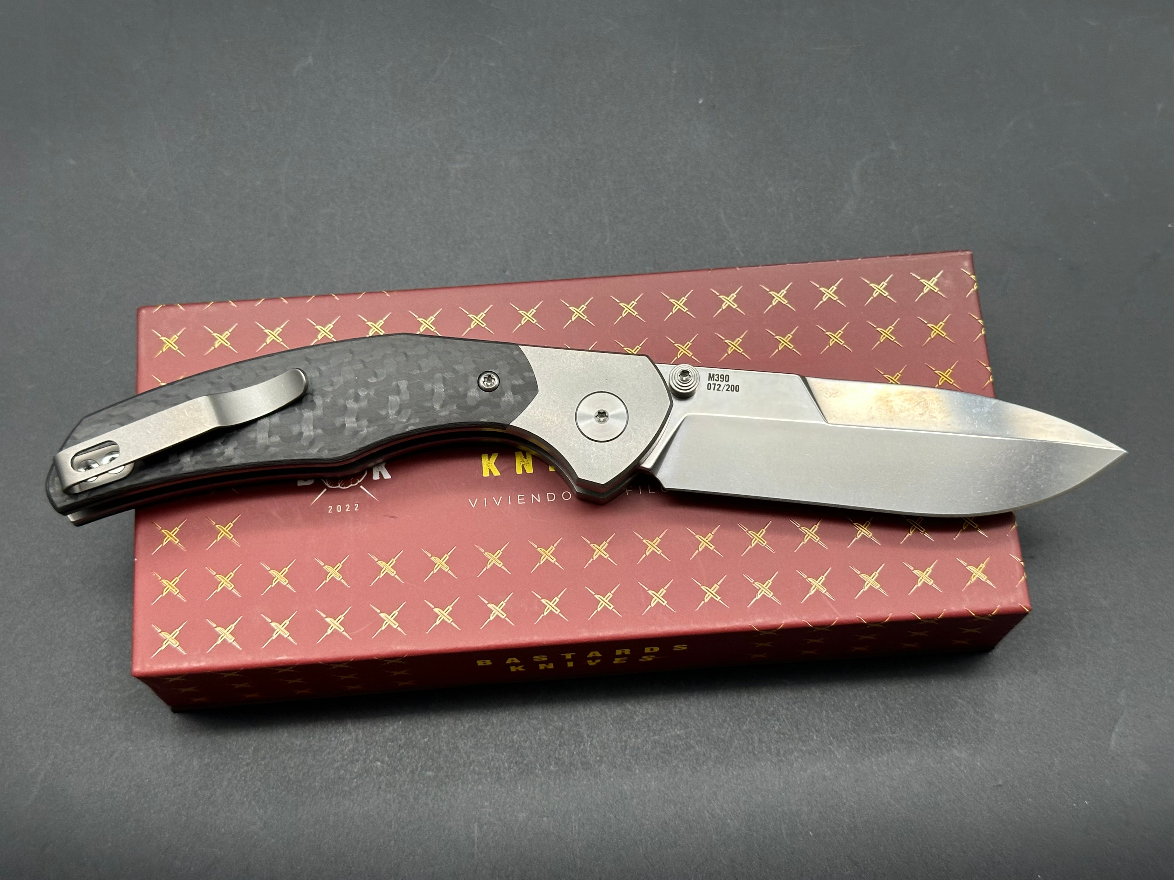 BASTARD KNIVES UTOPIA Button Lock Pocket Knife - M390 Blade, Carbon Fiber & Titanium Handle - EDC Folding Knife for Outdoor, Camping & Everyday Carry