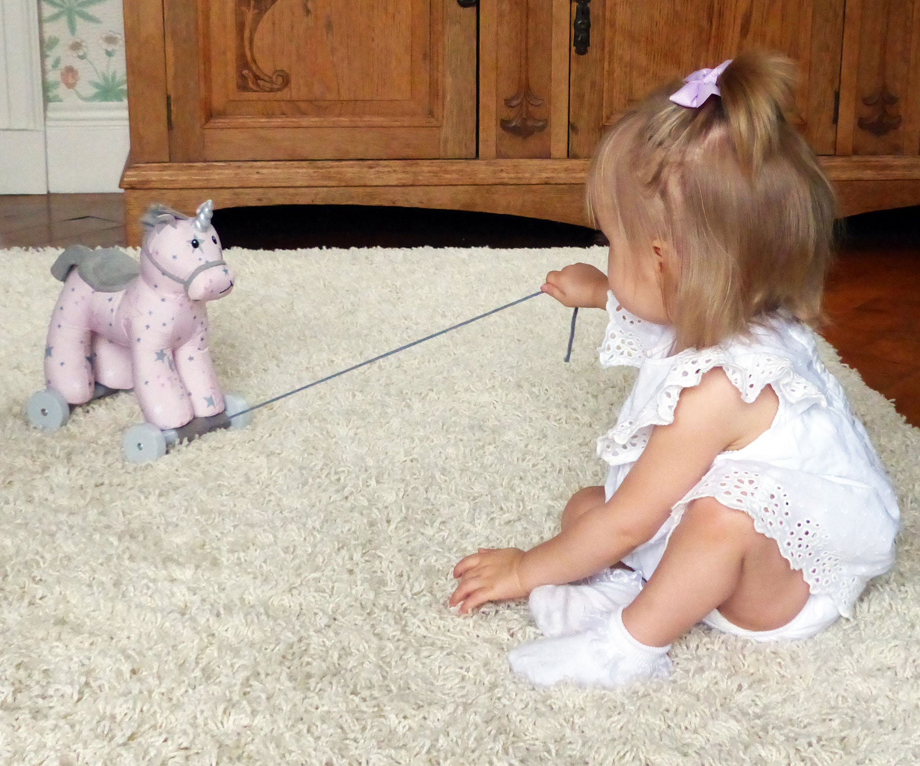 Celeste Unicorn Pull Along Toy for Kids - Adorable Walking Plush Stuffed Animal with Wheels - Perfect for Toddler Birthday Gifts & Preschool Playtime Activities
