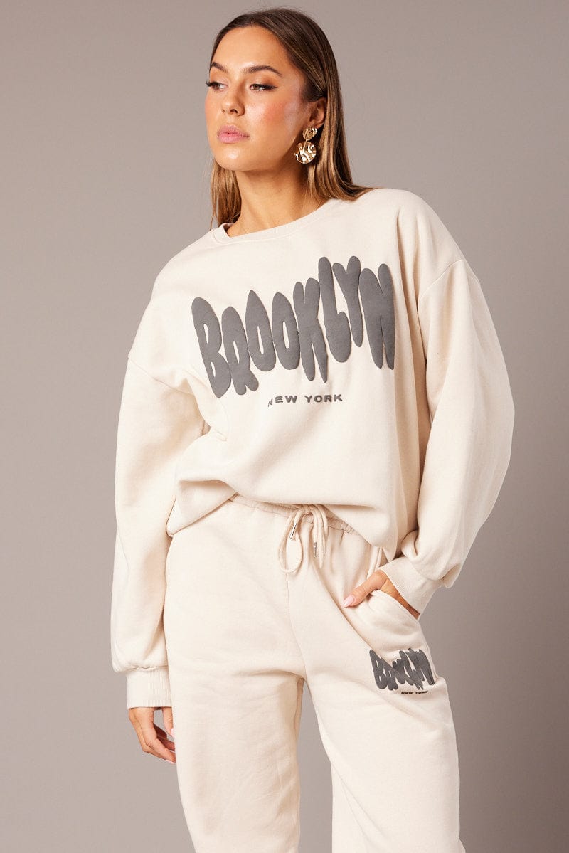 Stylish Beige Graphic Print Long Sleeve Sweater for Women | Cozy Fall & Winter Fashion | Perfect for Casual Outings, Office Wear & Date Nights
