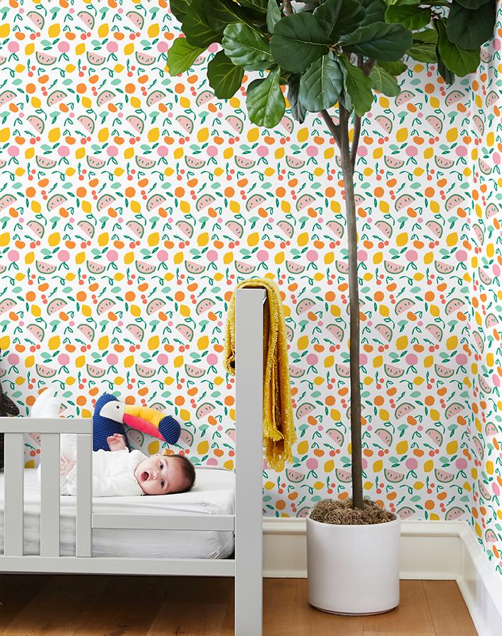 Tea Collection 'Island Fruits' Wallpaper in Melon Green - Tropical Fruit Pattern Peel & Stick Wallpaper for Kitchen, Bathroom, or Nursery Decor