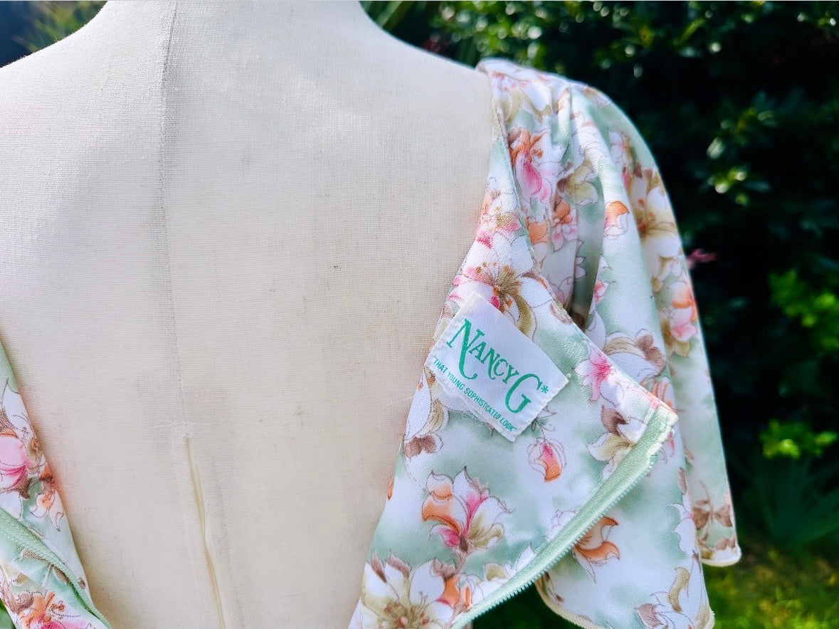 Vintage 1960s Orange & Pink Floral Maxi Dress - Nancy G Flower Empire Waist V-Neck Summer Long Dress with Flutter Sleeves | Retro Boho Chic Outfit for Beach Wedding, Music Festival & Vintage Theme Party