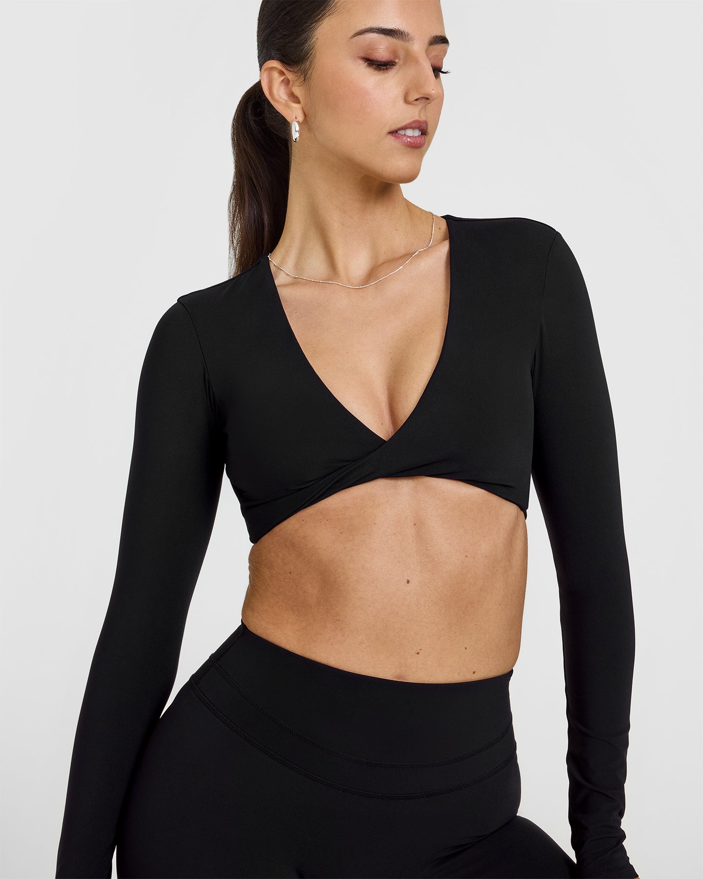 Stylish Black Twist Front Long Sleeve Crop Top for Women | Fashionable Layering Piece for Fall & Winter | Perfect for Casual Outings, Date Nights & Streetwear Looks
