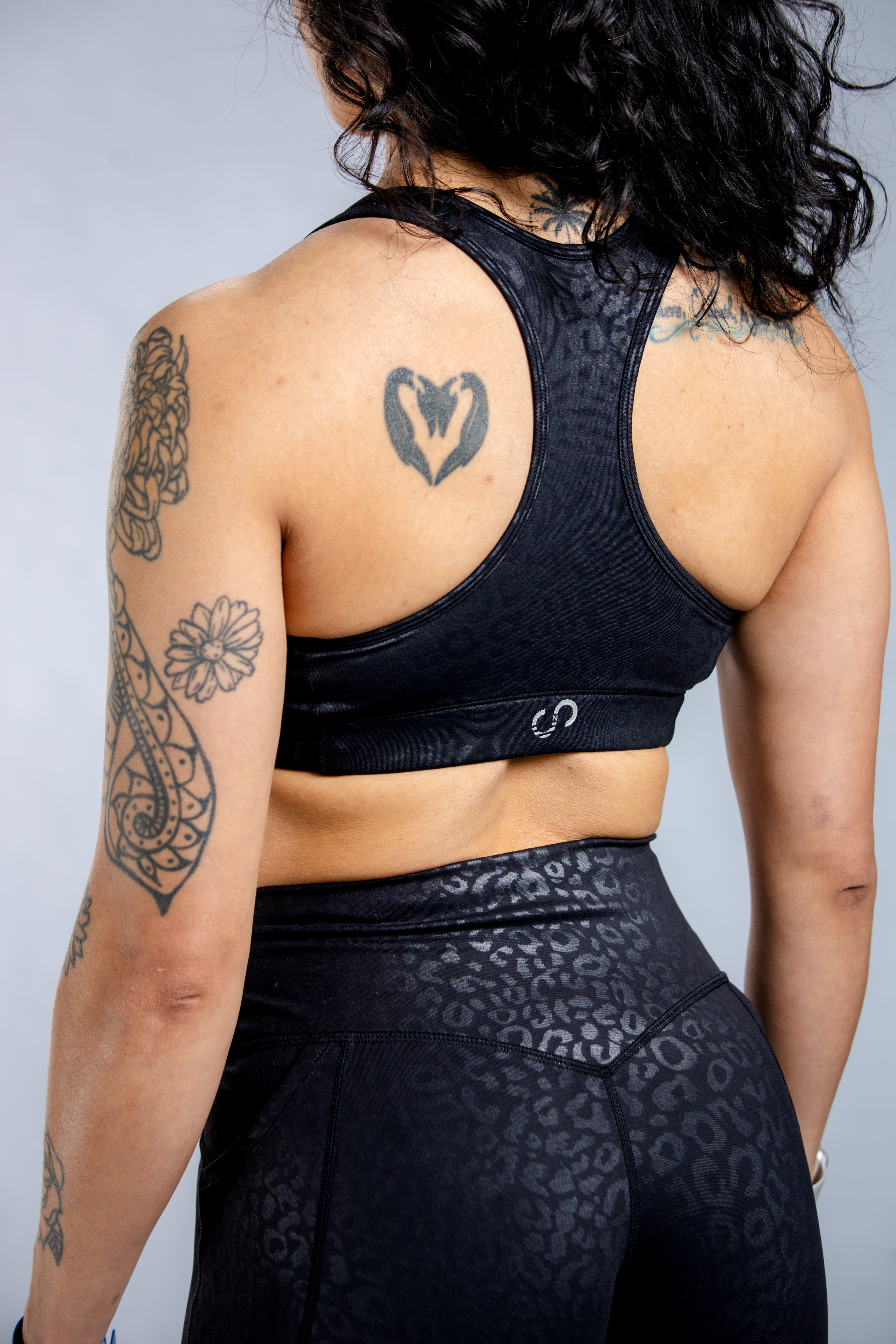 High-Performance Empowered Sports Bra - Black Leopard Print | Women's Workout & Yoga Support Top for Running, Gym & Active Lifestyle