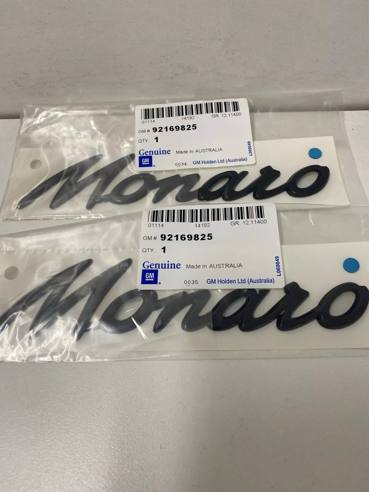 Genuine Holden V2 VY 2002-2004 Monaro 14 Panel Badge Pair (Part #92169825) - Perfect Replacement for Monaro Car Emblems & Exterior Decoration