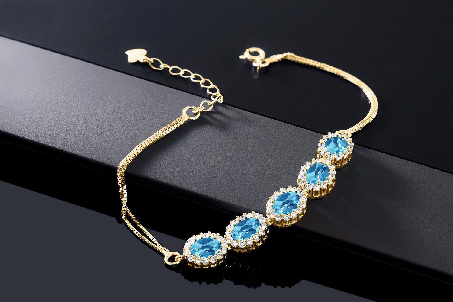 Gem Stone King 7X5MM Oval Cut Gemstone Birthstone Tennis Bracelet for Women - 18K Yellow Gold Plated Sterling Silver | 7 Inch Adjustable Chain with 1.5 Inch Extender | Elegant Fine Jewelry Gift for Mom, Wife, Anniversary, Birthday | Perfect for Weddings, Parties & Special Occasions