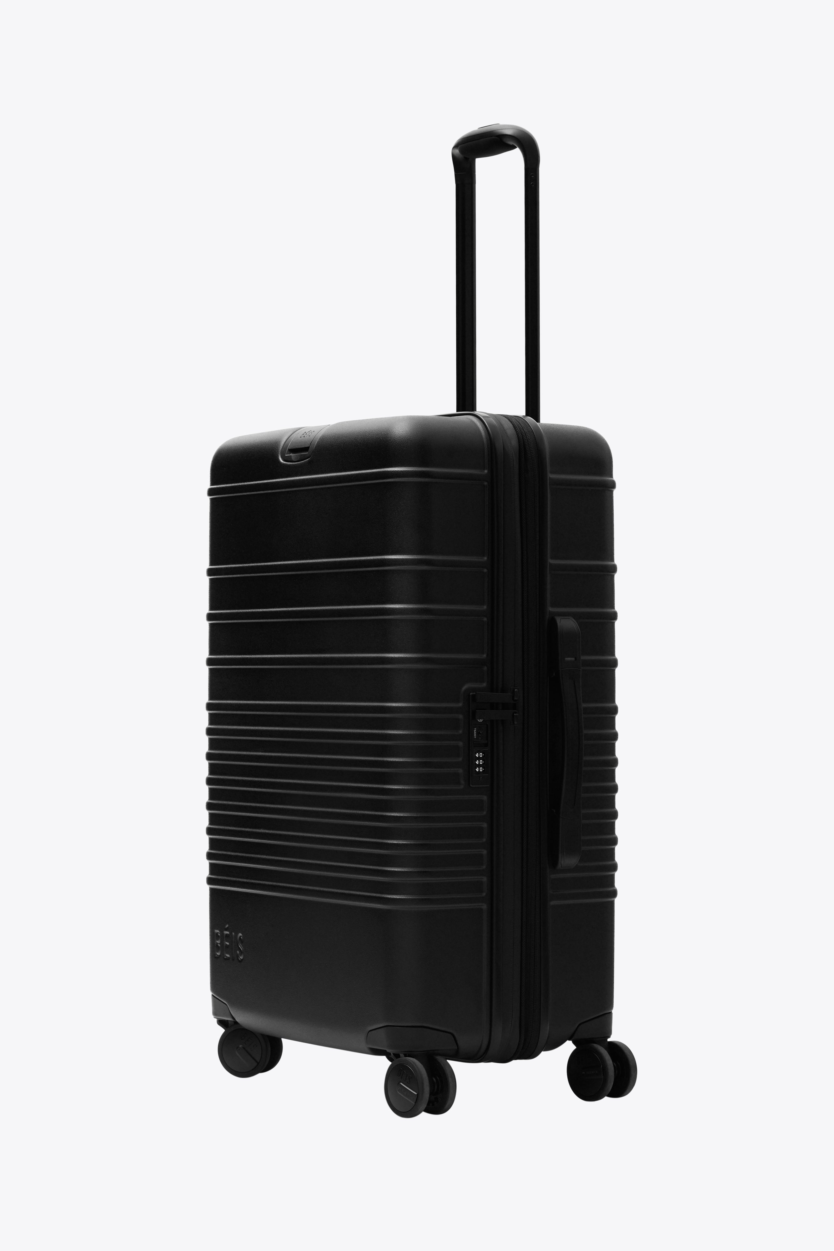 All Black Medium Check-In Roller Luggage - Perfect for Business Travel & Weekend Getaways