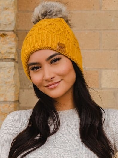 Mustard Cable Knit Beanie with Faux Fur Pom Pom - Winter Warm Knitted Hat for Women & Men - Perfect for Skiing, Snowboarding & Cold Weather Fashion