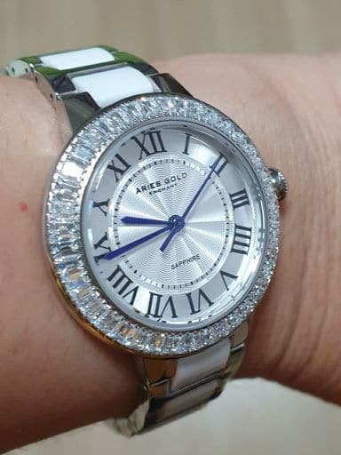 ARIES GOLD ENCHANT CAPELLA Silver Stainless Steel Women's Watch with White Ceramic Band - Elegant Dress Watch for Office, Party & Special Occasions