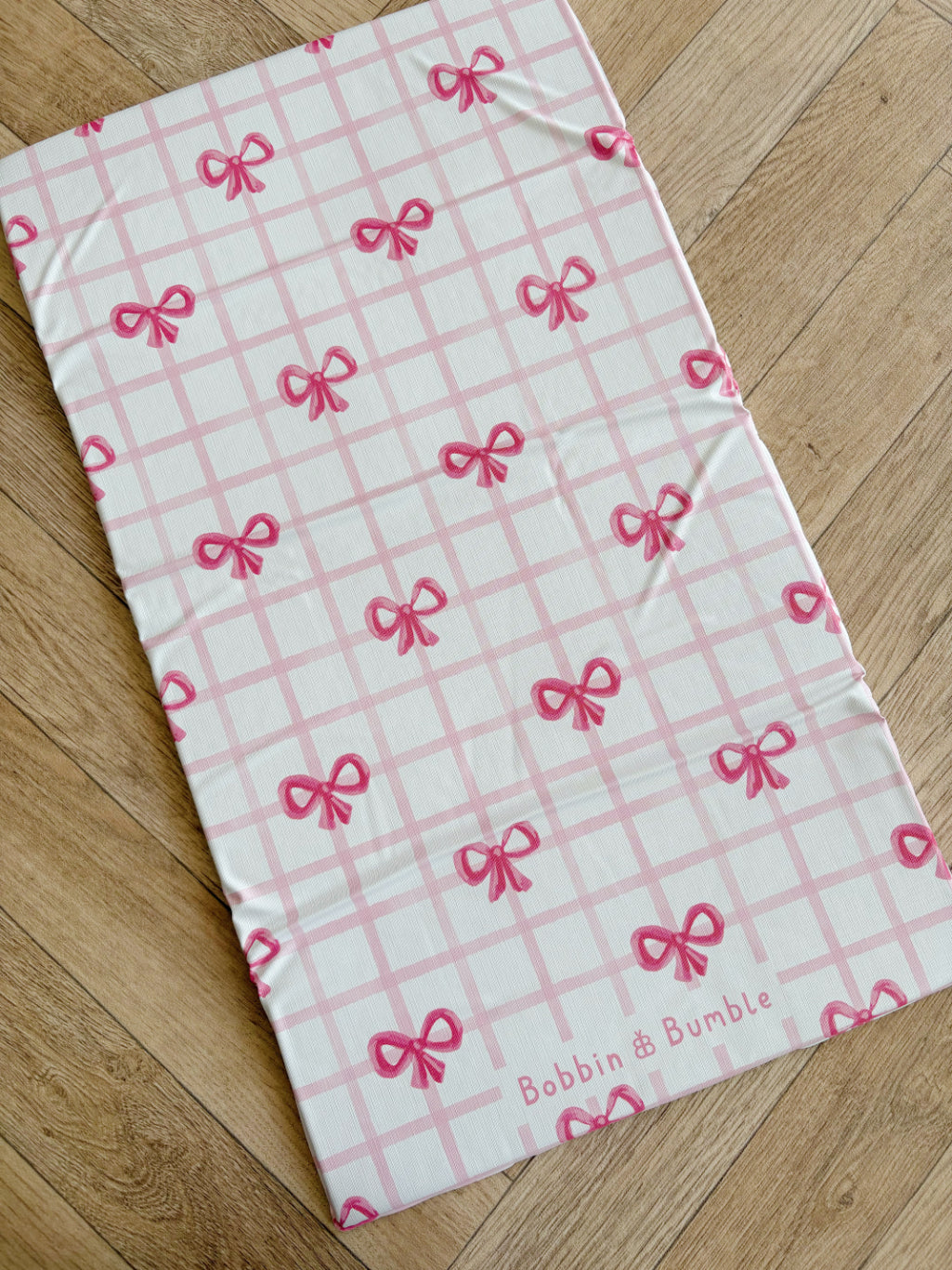 Portable Baby Changing Mat with Pink Bows - Waterproof Foldable Travel Changing Pad for Infants - Perfect for Diaper Changes On-The-Go, Airplane Travel & Outdoor Adventures