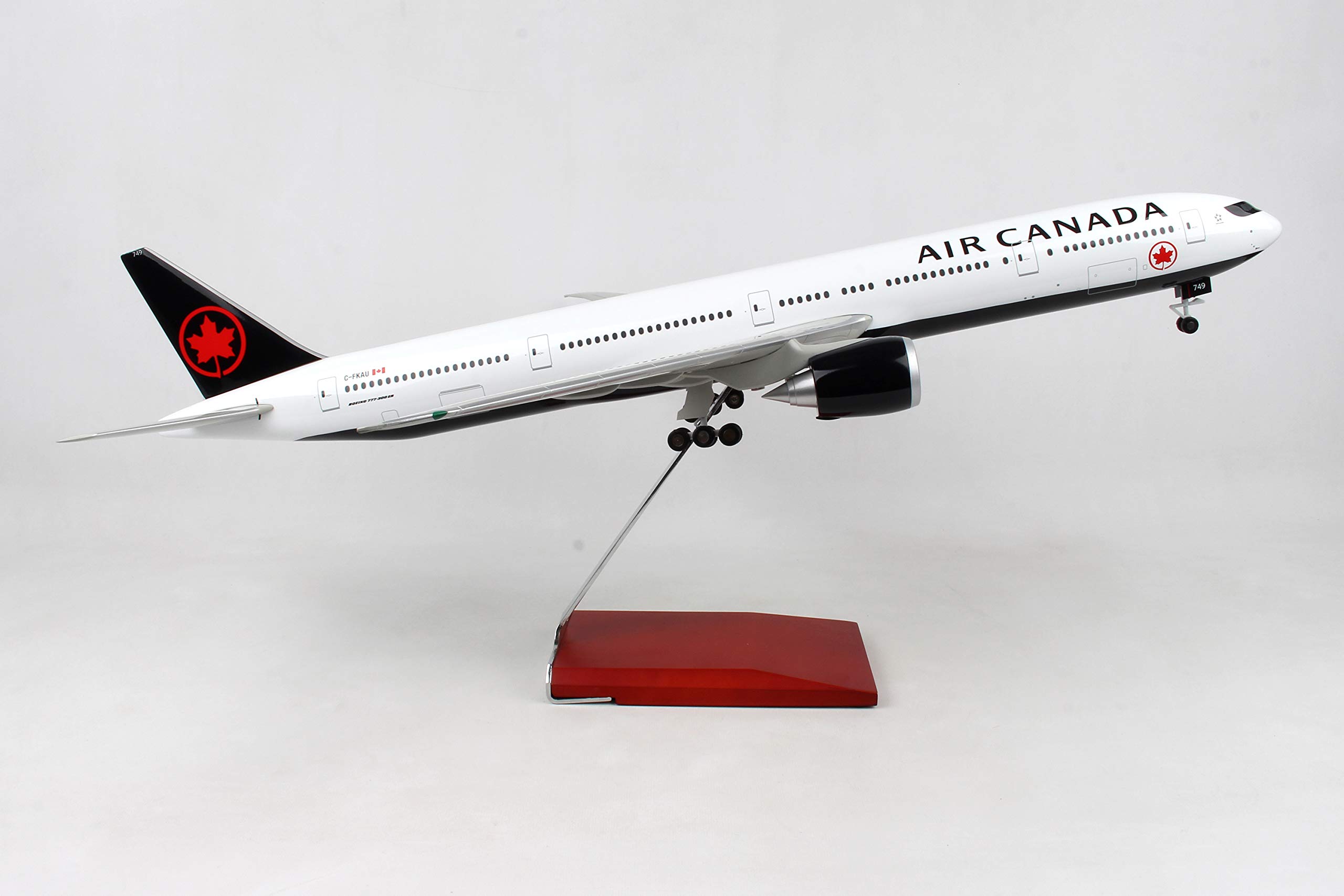 Daron 1/100 Scale Air Canada Boeing 777-300ER Diecast Model Airplane with Wood Display Stand & Landing Gear - Collectible Aircraft for Aviation Enthusiasts, Home Office Decor & Gift for Plane Lovers