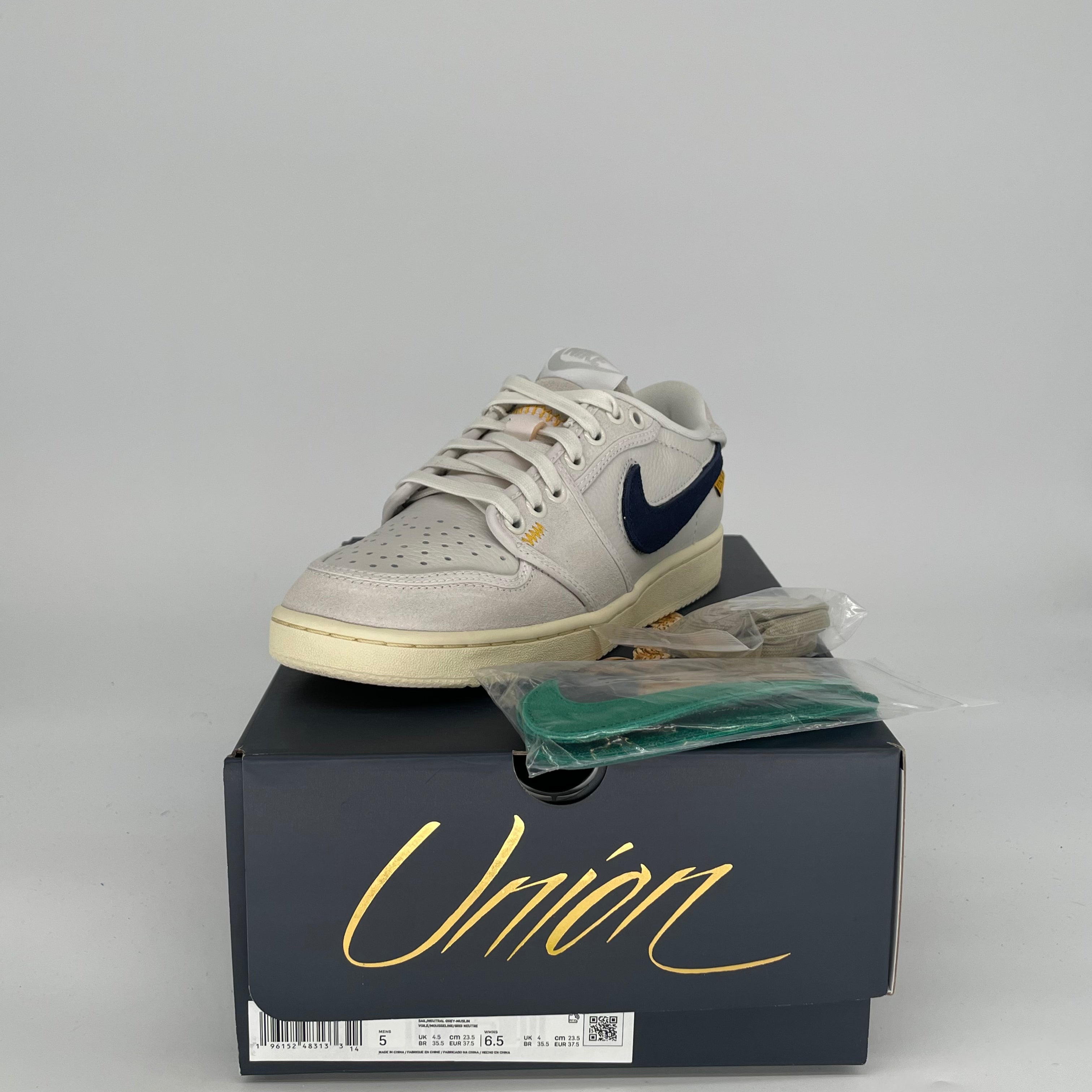 Original Title: AIR JORDAN 1 LOW AJKO UNION SAIL LEATHER SIZE 5/6.5W DZ4864 100   Optimized Title: **Air Jordan 1 Low AJKO Union Sail Leather Sneakers - Women's Size 5/6.5W (DZ4864-100) - Retro Style for Casual Wear & Street Fashion**
