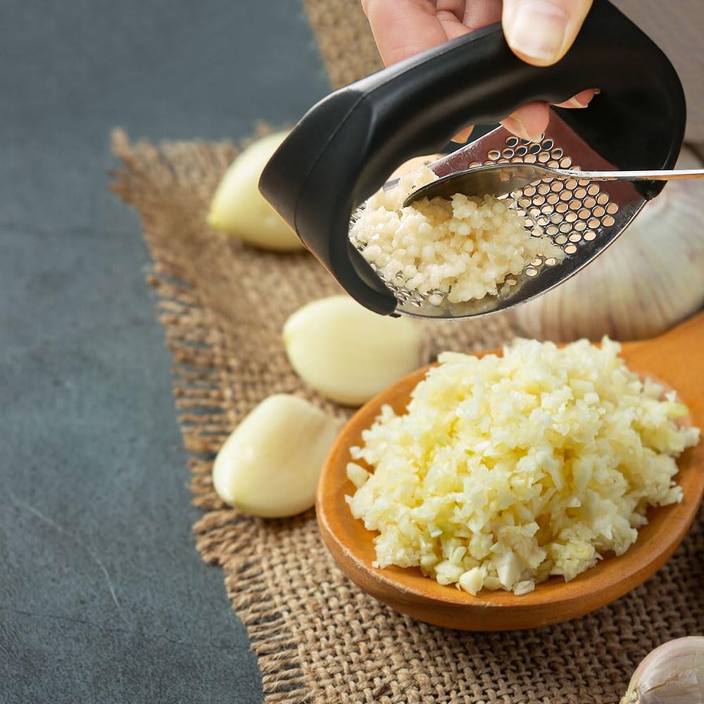 2024 Upgraded Stainless Steel Garlic Press with Peeler - Heavy Duty Garlic Crusher & Mincer for Cooking, Baking, and Meal Prep - Perfect for Kitchens, Restaurants, and Home Chefs (Black)