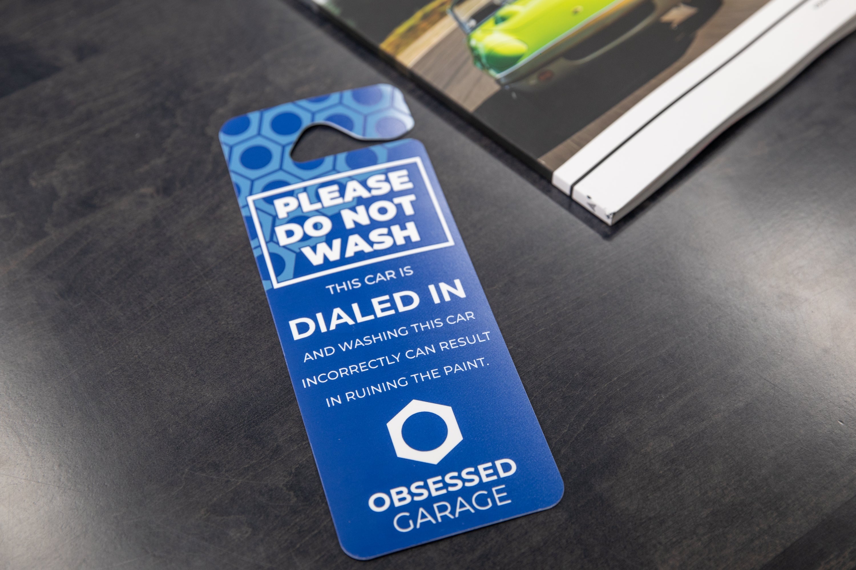 Obsessed Garage 'Please Do Not Wash' Mirror Hanger for Emira - Perfect for Car Shows & Giveaways