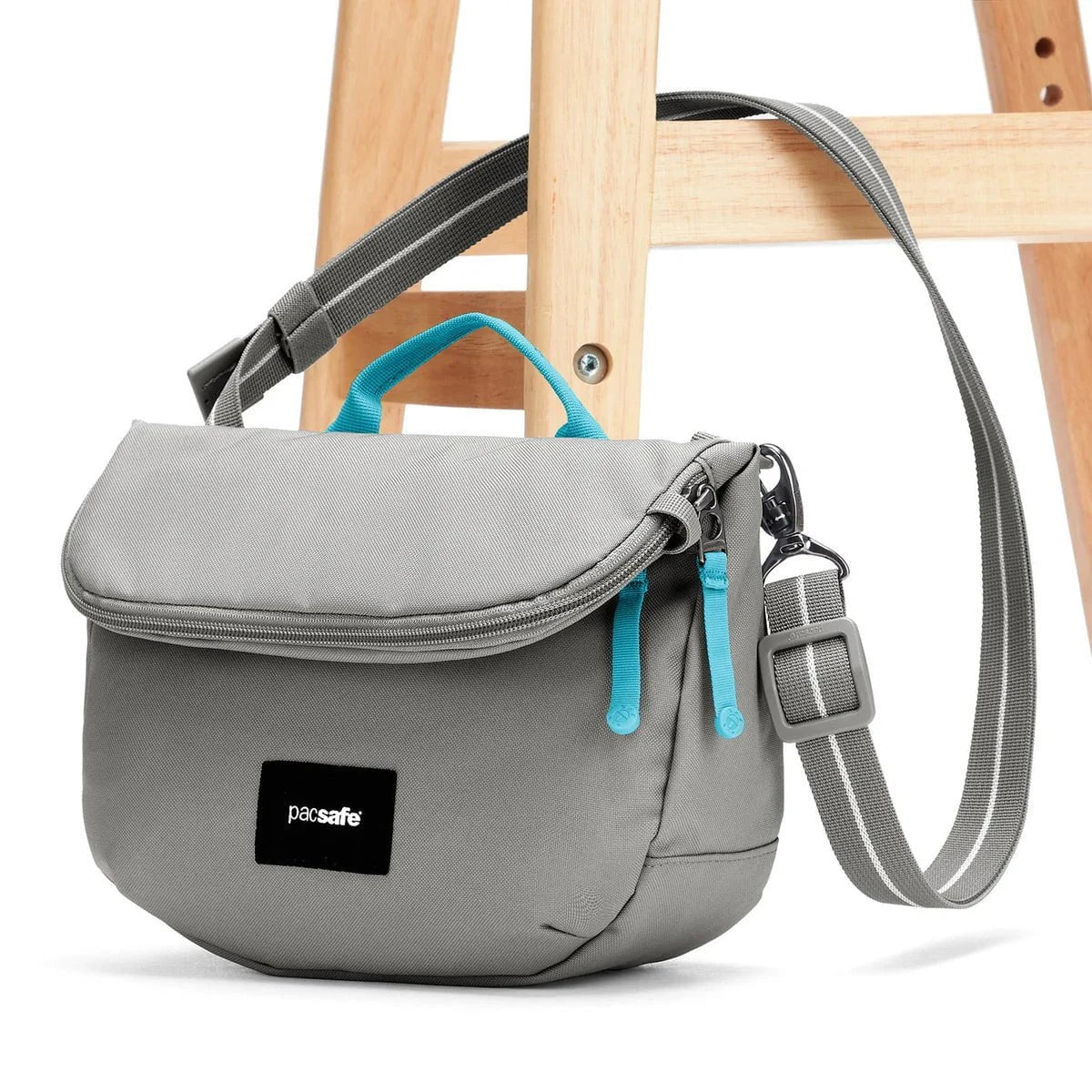 Pacsafe GO Anti-Theft Saddle Crossbody Bag - Secure Travel Purse for Women & Men - Perfect for Commuting, Shopping & Sightseeing