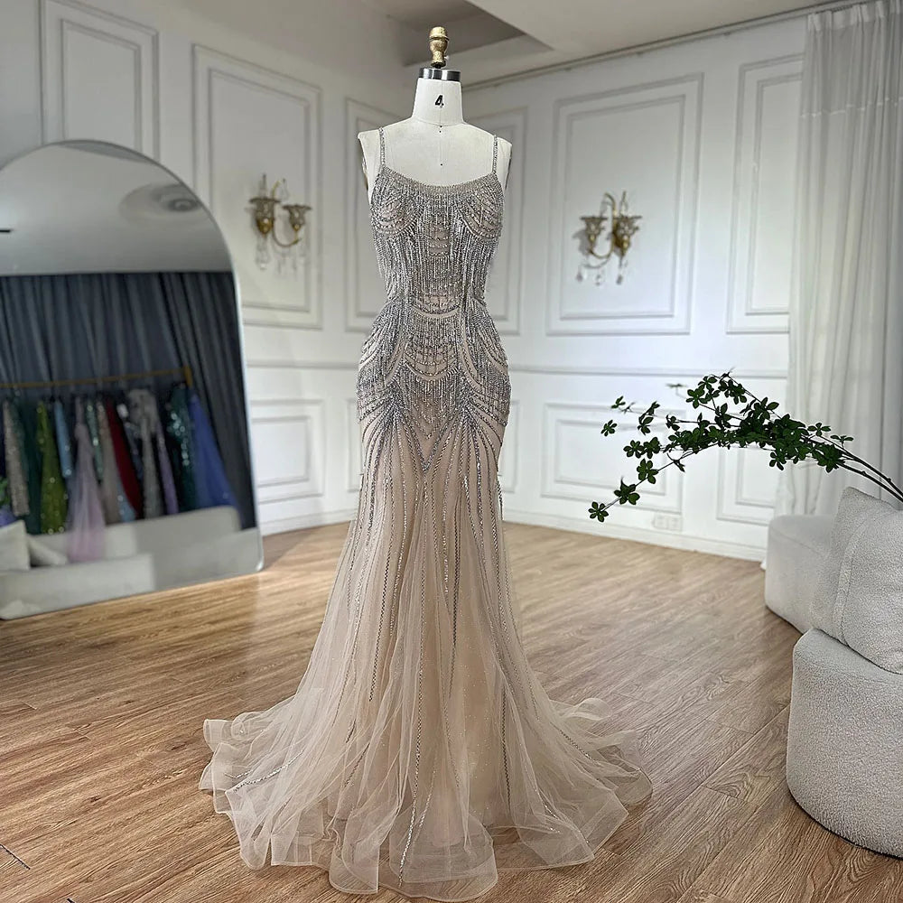 Elegant Silver Nude Spaghetti Strap Mermaid Evening Gown with Beaded Tassels - Dubai Luxury Formal Dress for Prom, Gala & Special Occasions - LA72772