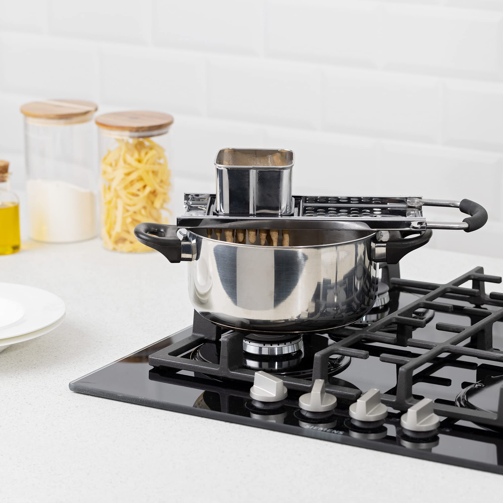 Navaris Stainless Steel Spaetzle Maker - Traditional German Egg Noodle & Dumpling Grater with Safety Pusher & Ergonomic Handle | Perfect for Making Homemade Spätzle, Pasta, and Dumplings | Ideal for German Cuisine Lovers and Home Cooks