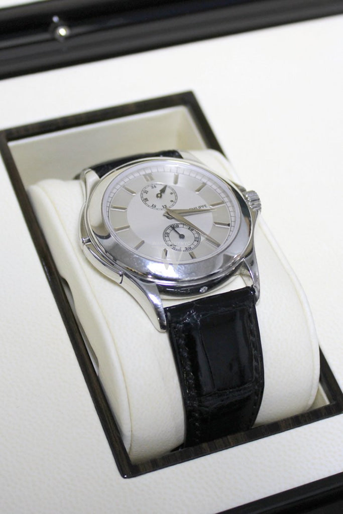 Patek Philippe 5134 Travel Time 18K Gold Men's Luxury Watch - Pre-Owned Swiss Mechanical Timepiece for Business Travel & Formal Occasions