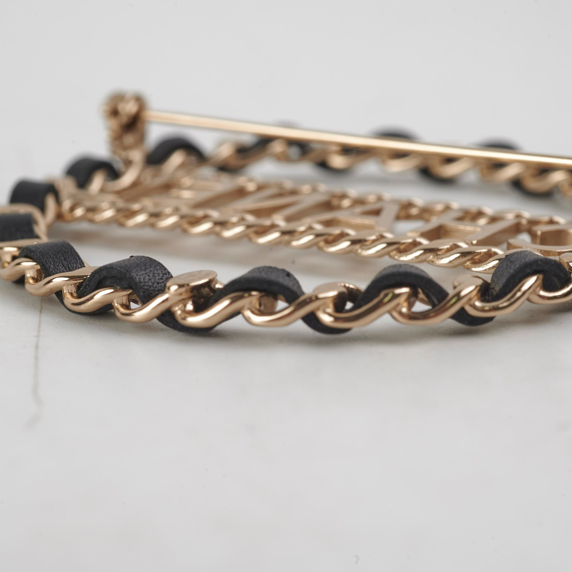 Chanel CC Round Black and Gold Brooch - Elegant Fashion Accessory for Women, Perfect for Dresses, Jackets, and Bags