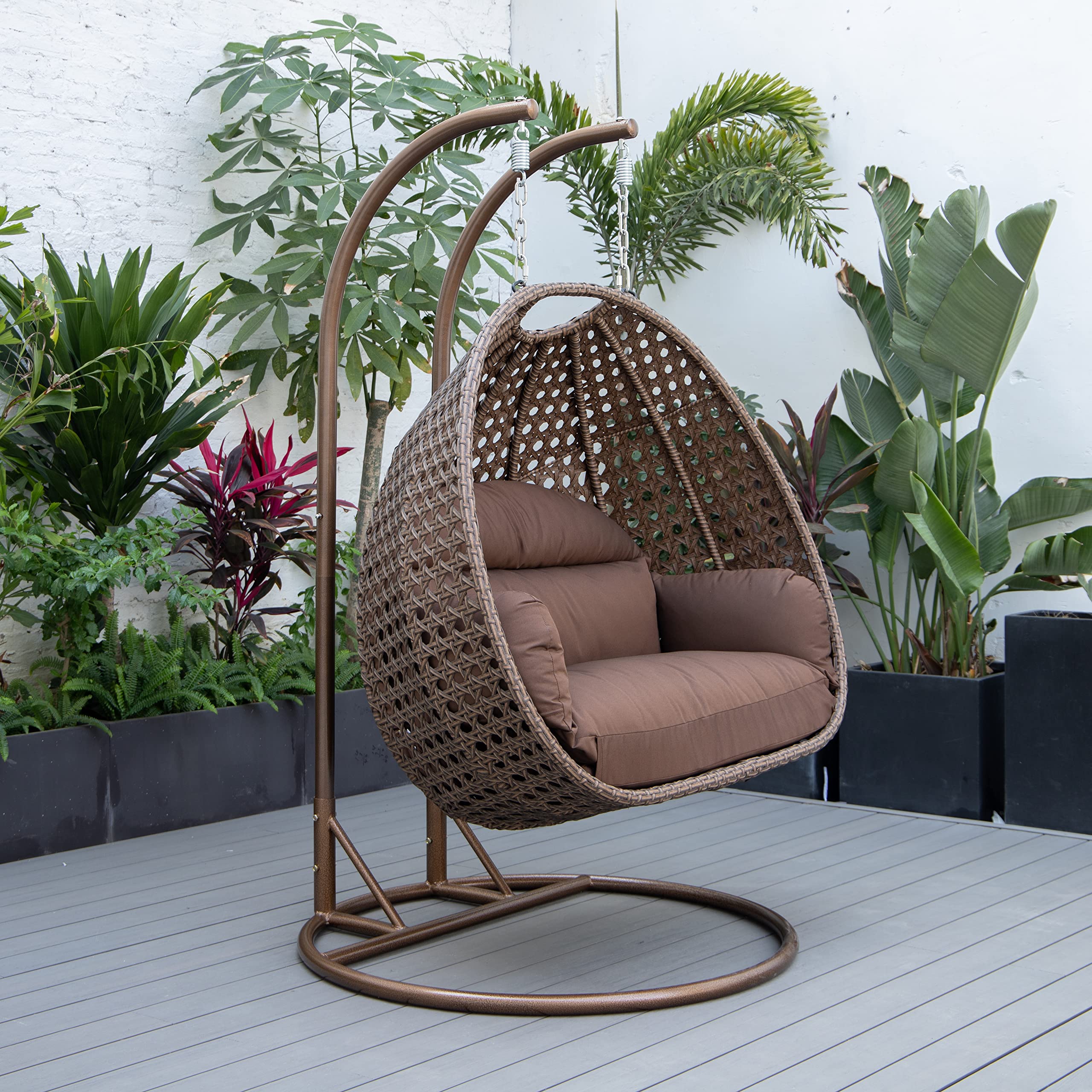 LeisureMod Mendoza Dark Brown Wicker 2-Person Patio Hanging Egg Swing Chair with Stand & Cushions - Indoor/Outdoor Use for Garden, Porch, Backyard, and Balcony (Brown)