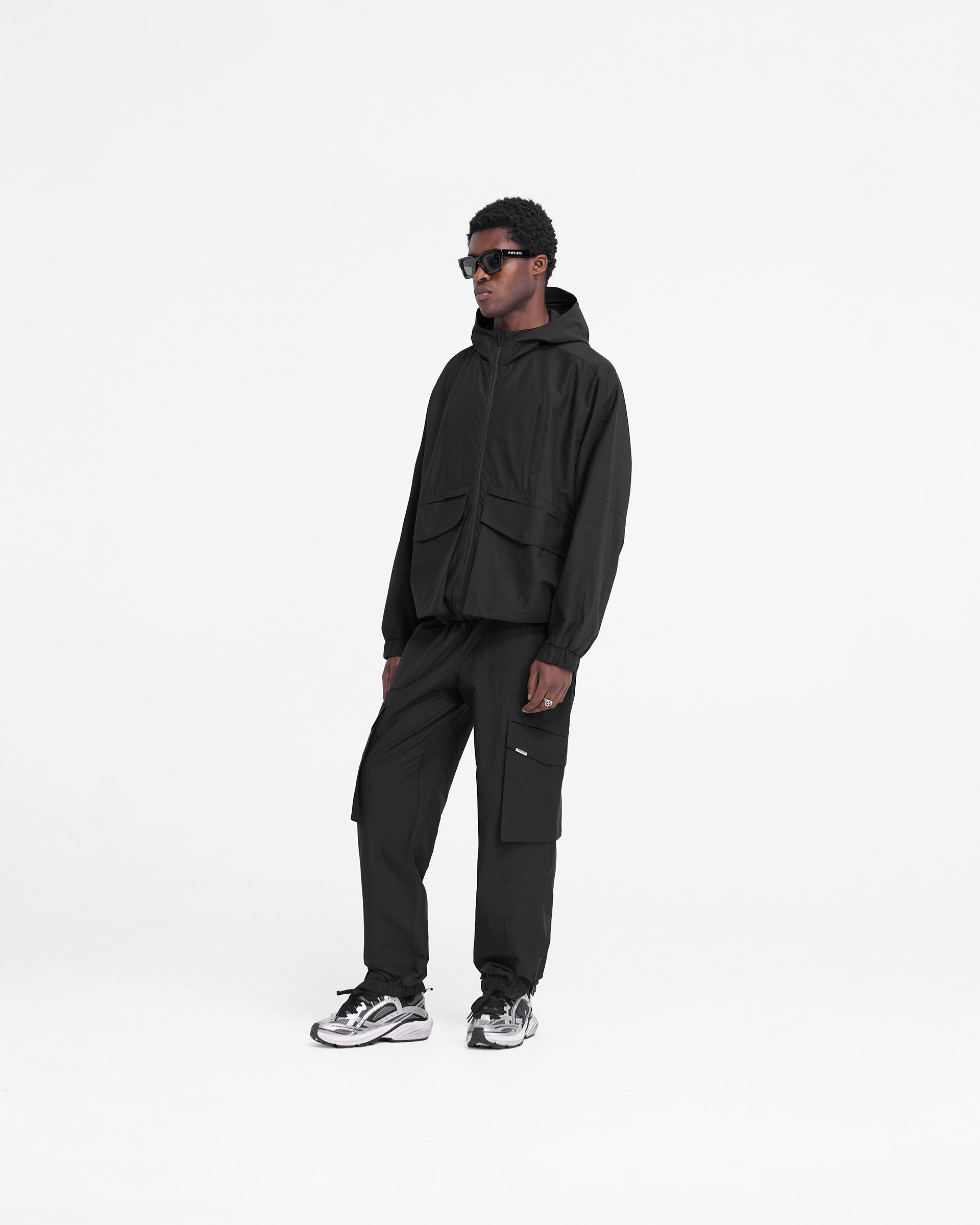 Tech Cargo Jacket for Men - Waterproof Windbreaker with Multiple Pockets | Outdoor Hiking, Travel & Urban Commute | Jet Black