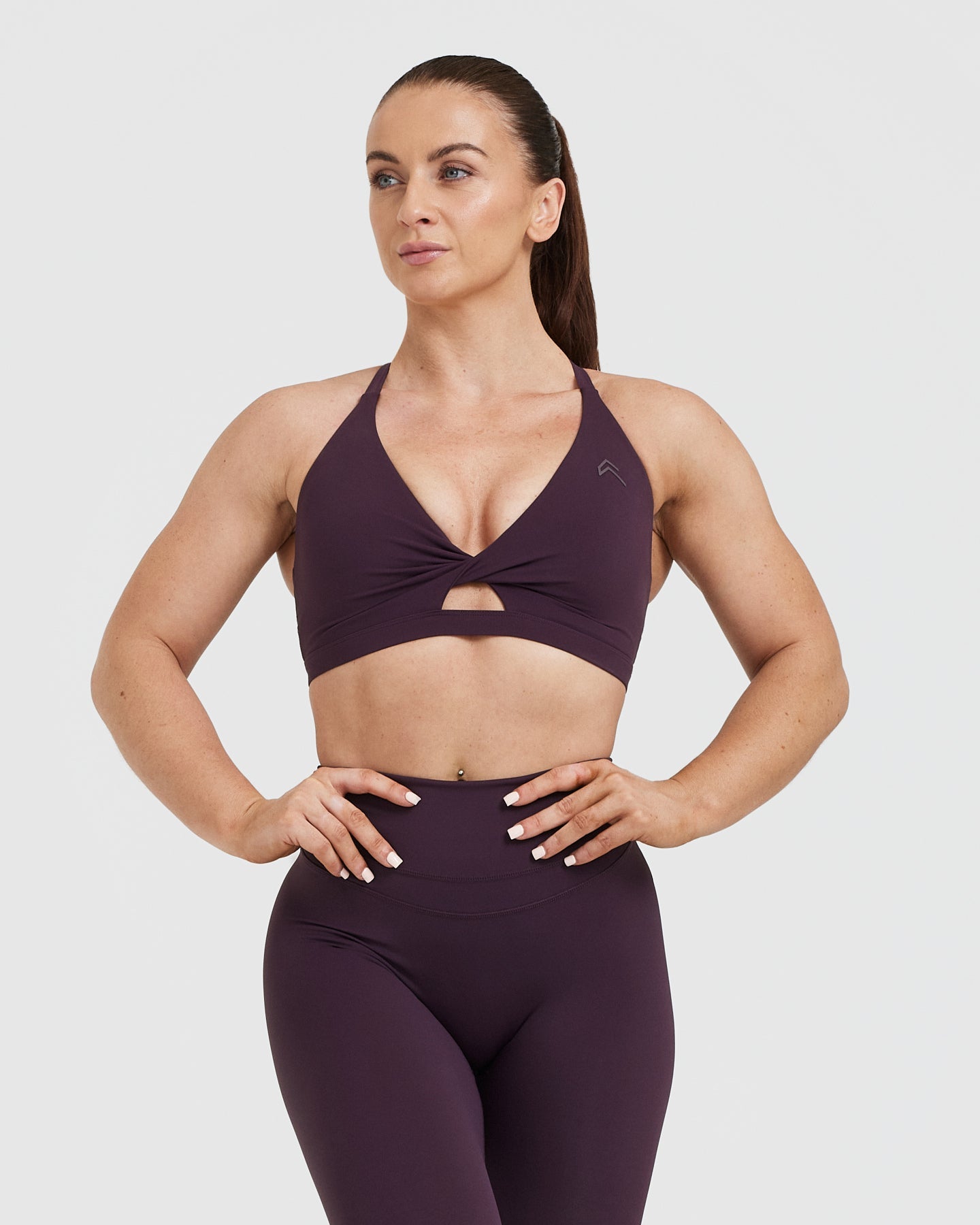 High-Performance Unified Twist Sports Bra in Blackberry Purple - Perfect for Yoga, Running & Gym Workouts