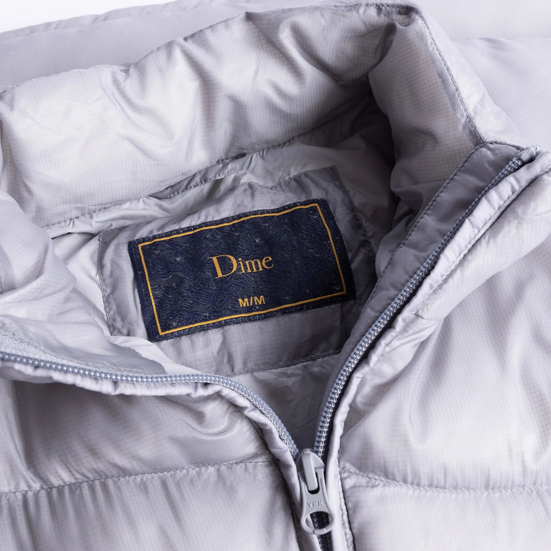 Classic Ripstop Puffer Jacket in Silver - Lightweight & Durable for Outdoor Adventures & Winter Fashion