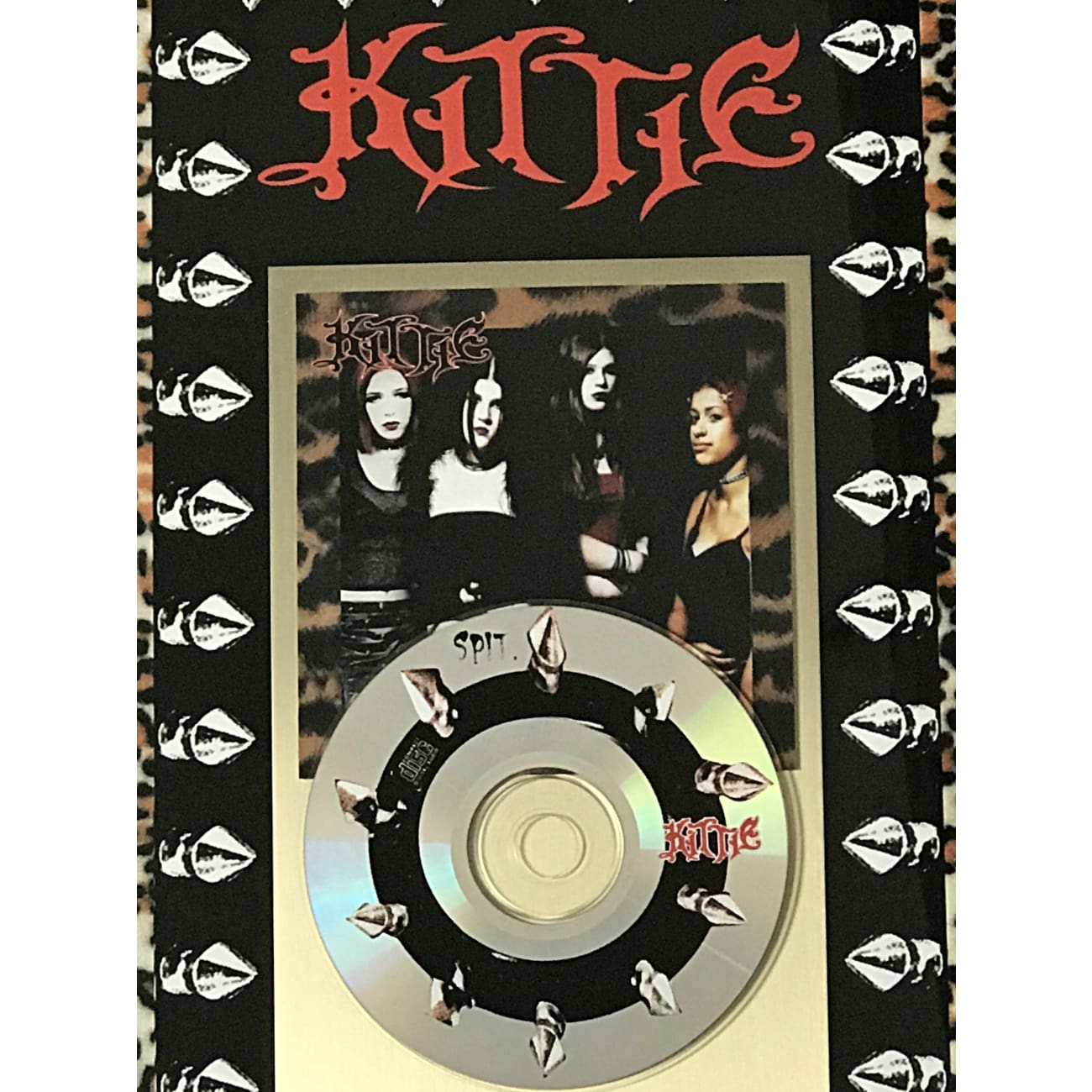 Kittie 'Spit' Album - Limited Edition Vinyl Record with Original Label & Award-Winning Rock Music - Perfect for Collectors and Heavy Metal Fans